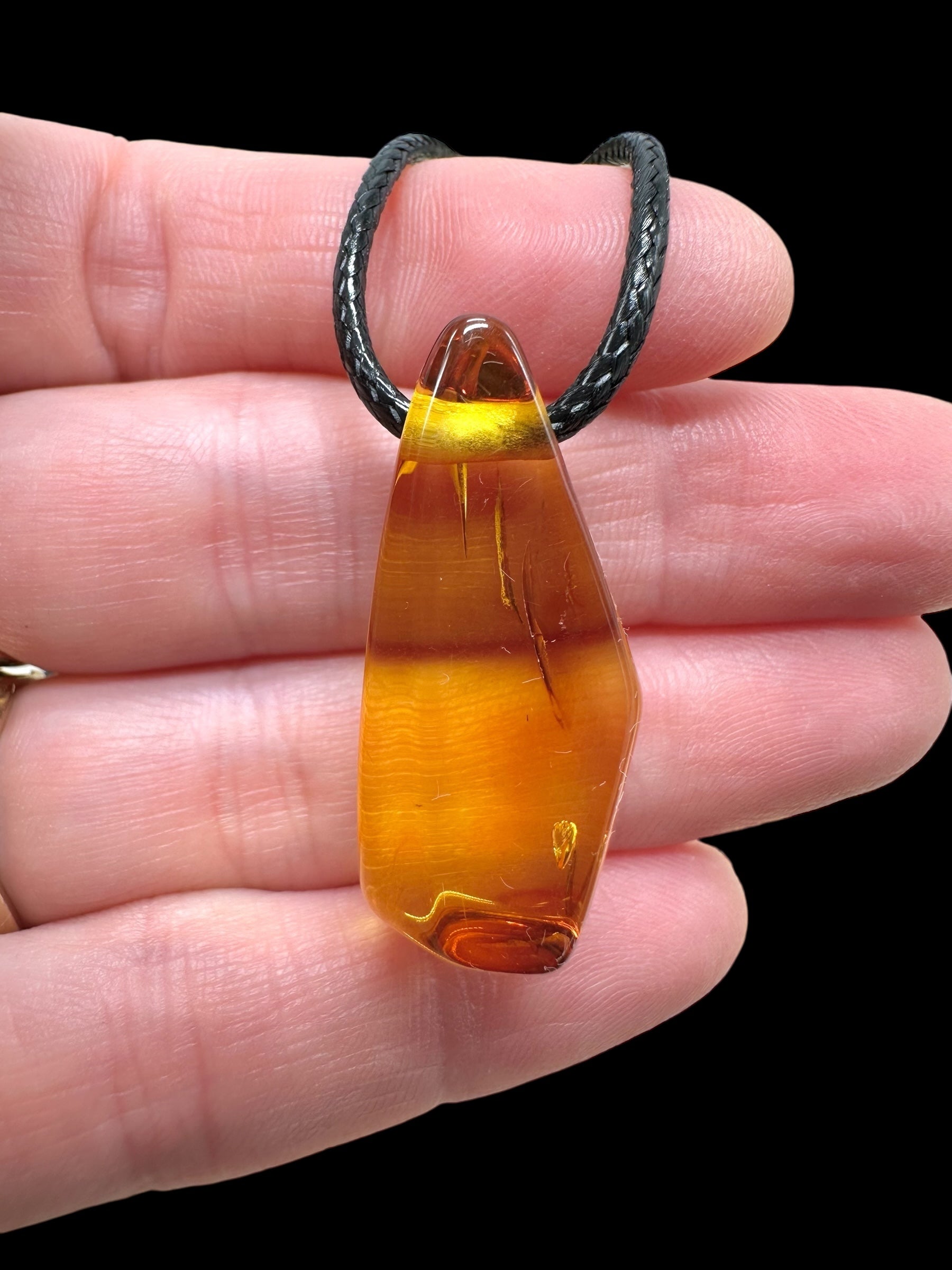 Amber pendant with leather cord – random piece - P/JN044