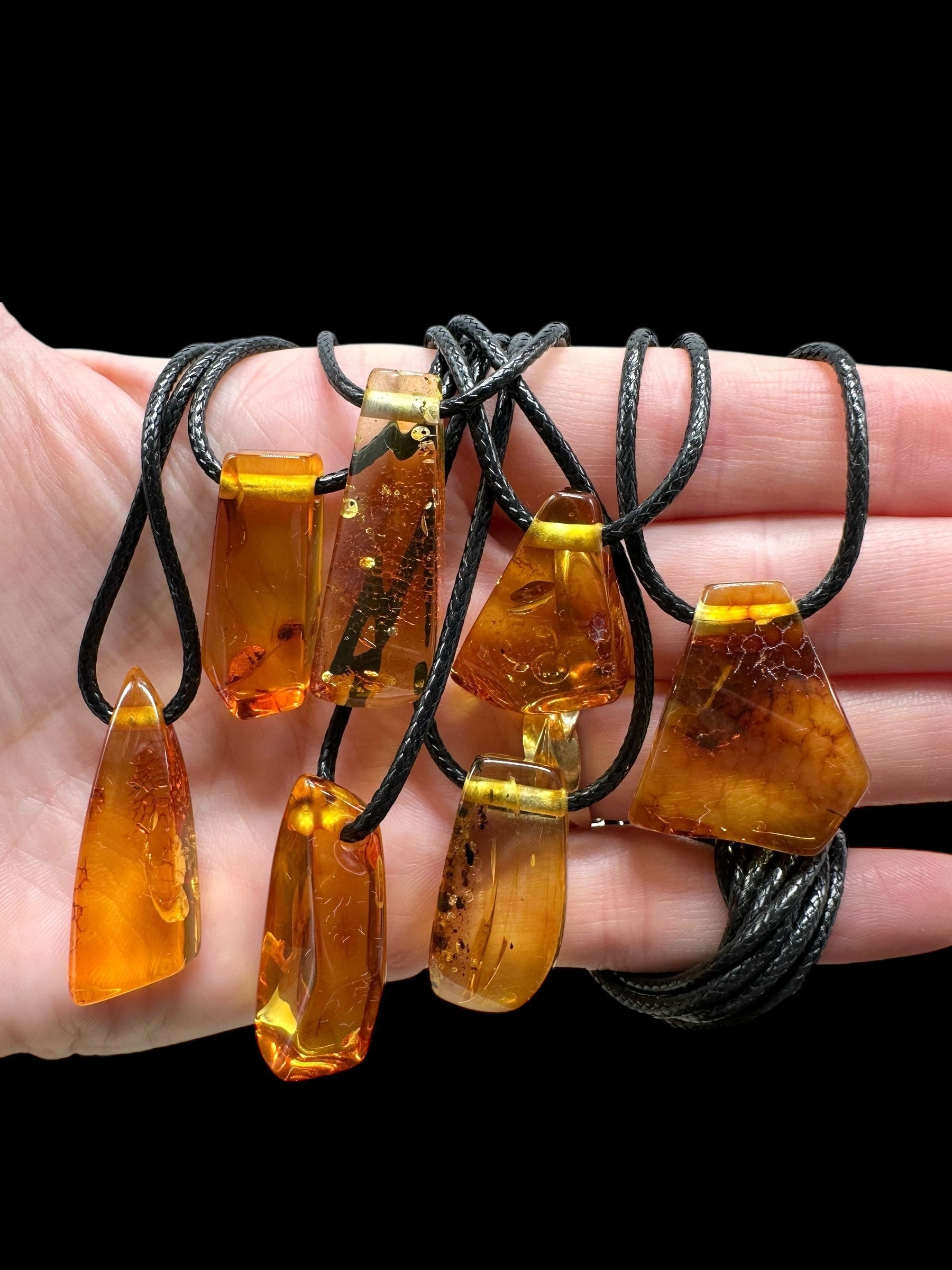 Amber pendant with leather cord – random piece - P/JN044