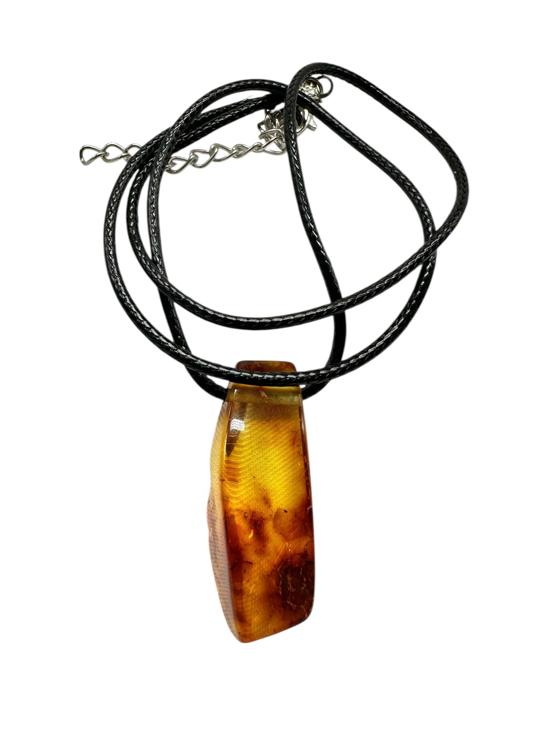 Amber pendant with leather cord