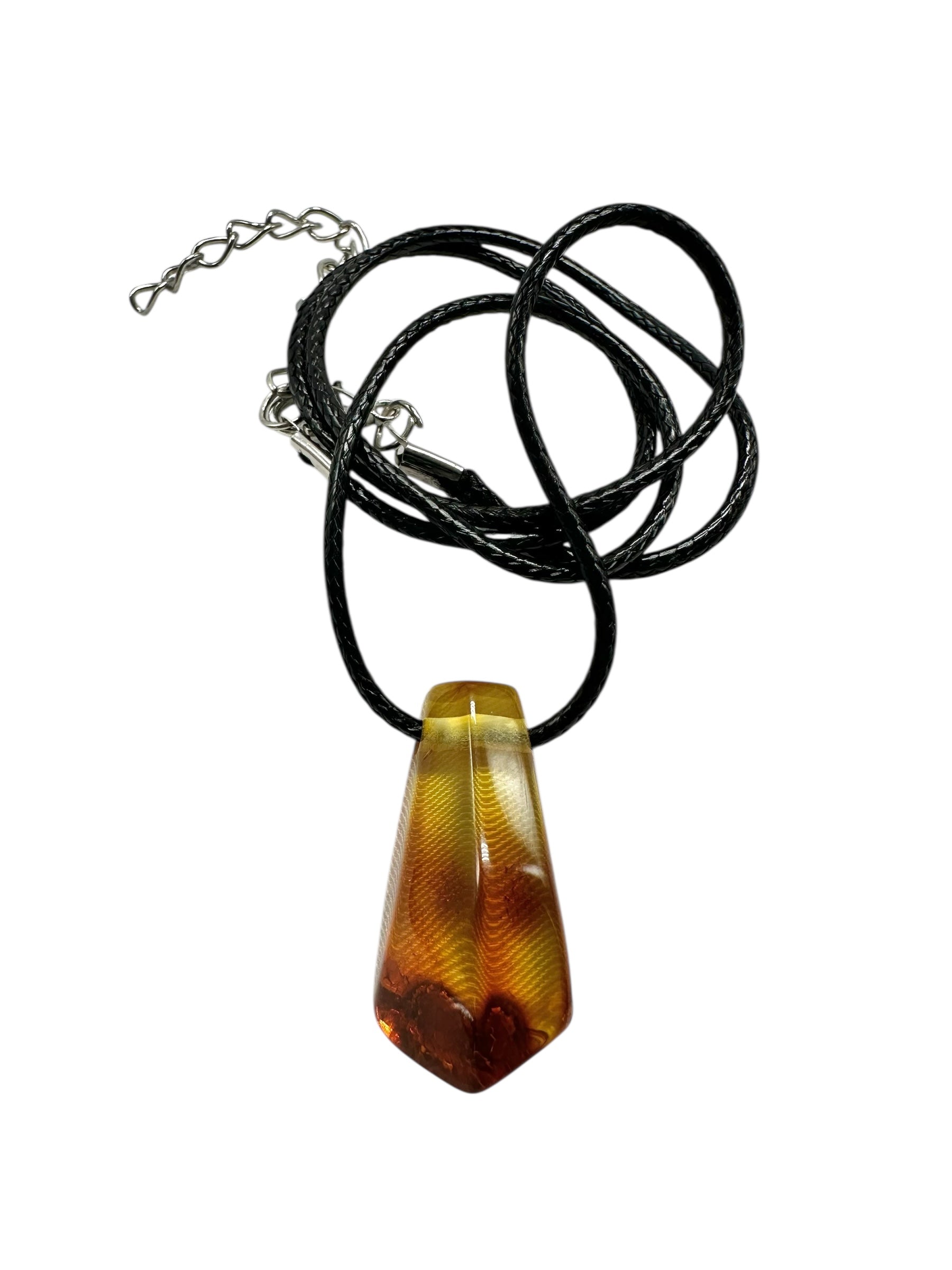 Amber pendant with leather cord