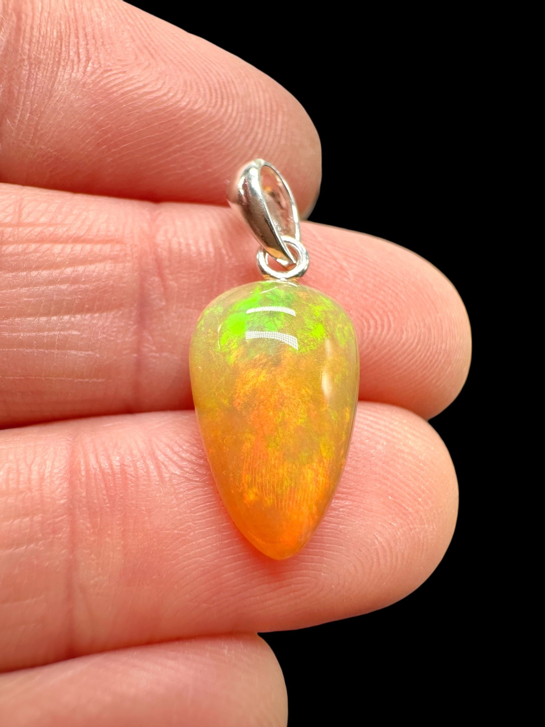 Silver faceted precious opal pendant