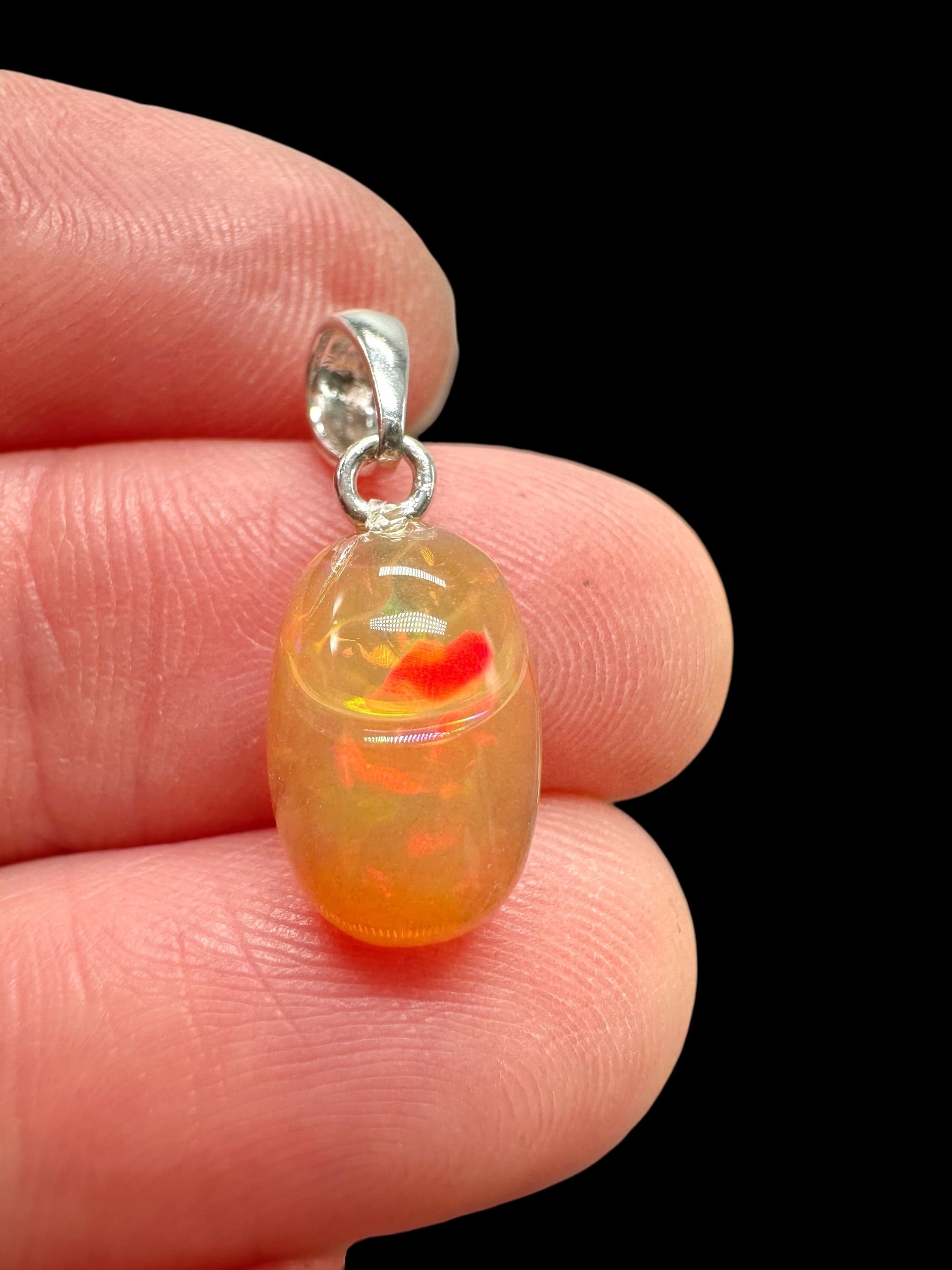 Silver faceted precious opal pendant