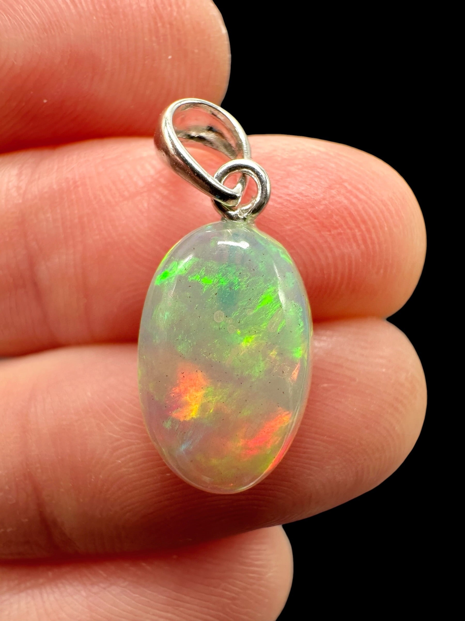 Silver faceted precious opal pendant
