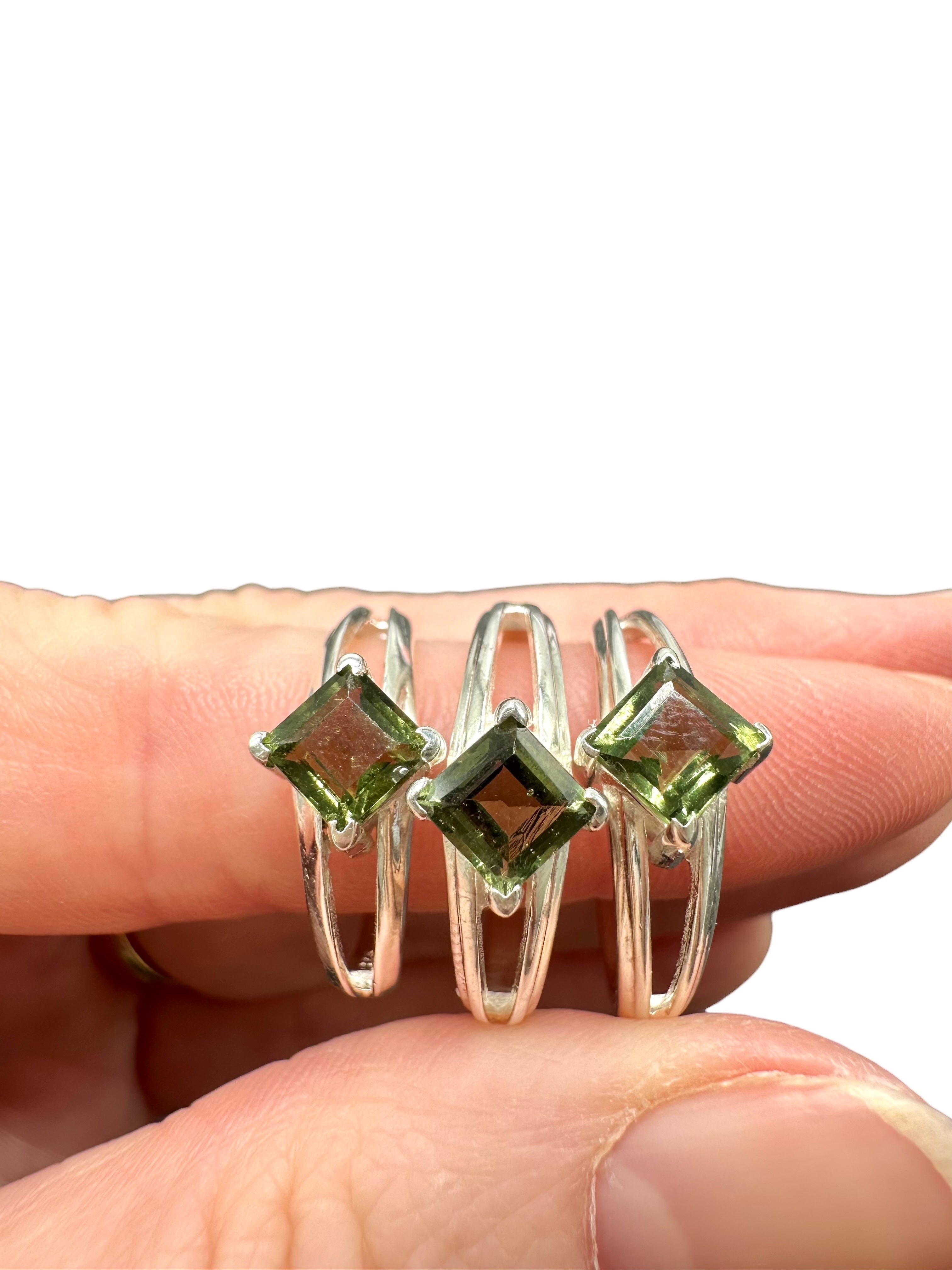 3 silver rings, different size, with cut moldavites