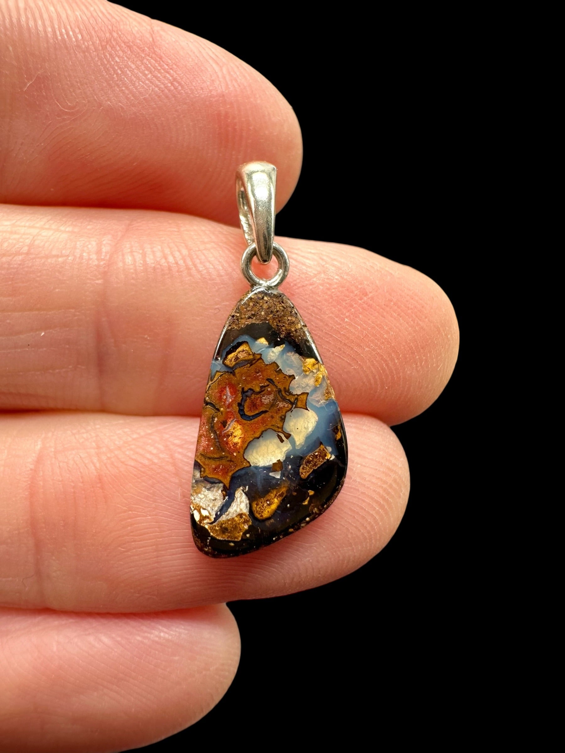 Silver pendant from Australian boulder opal