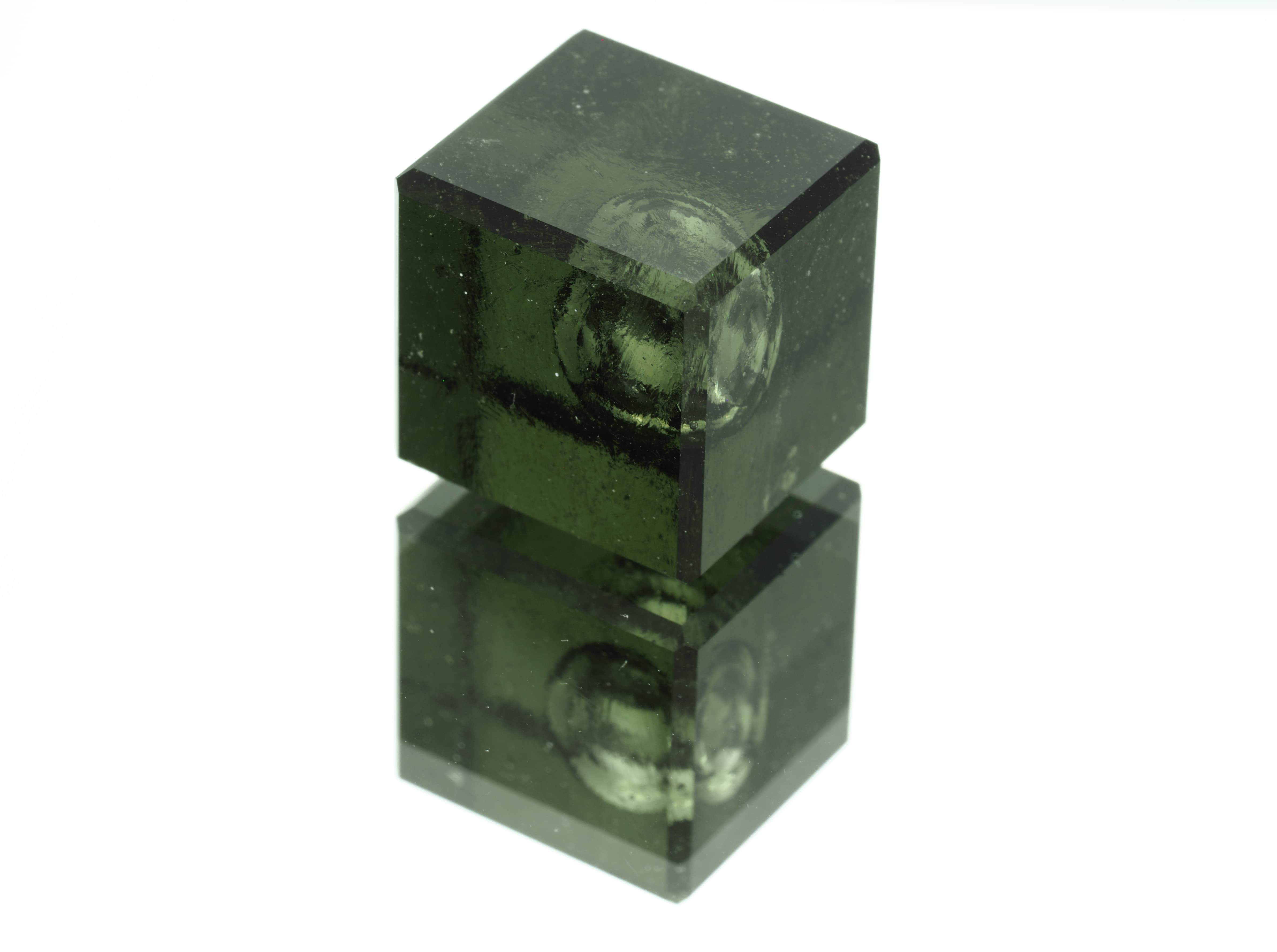Unique cut moldavite cube with a bubble 17,5ct - BV089
