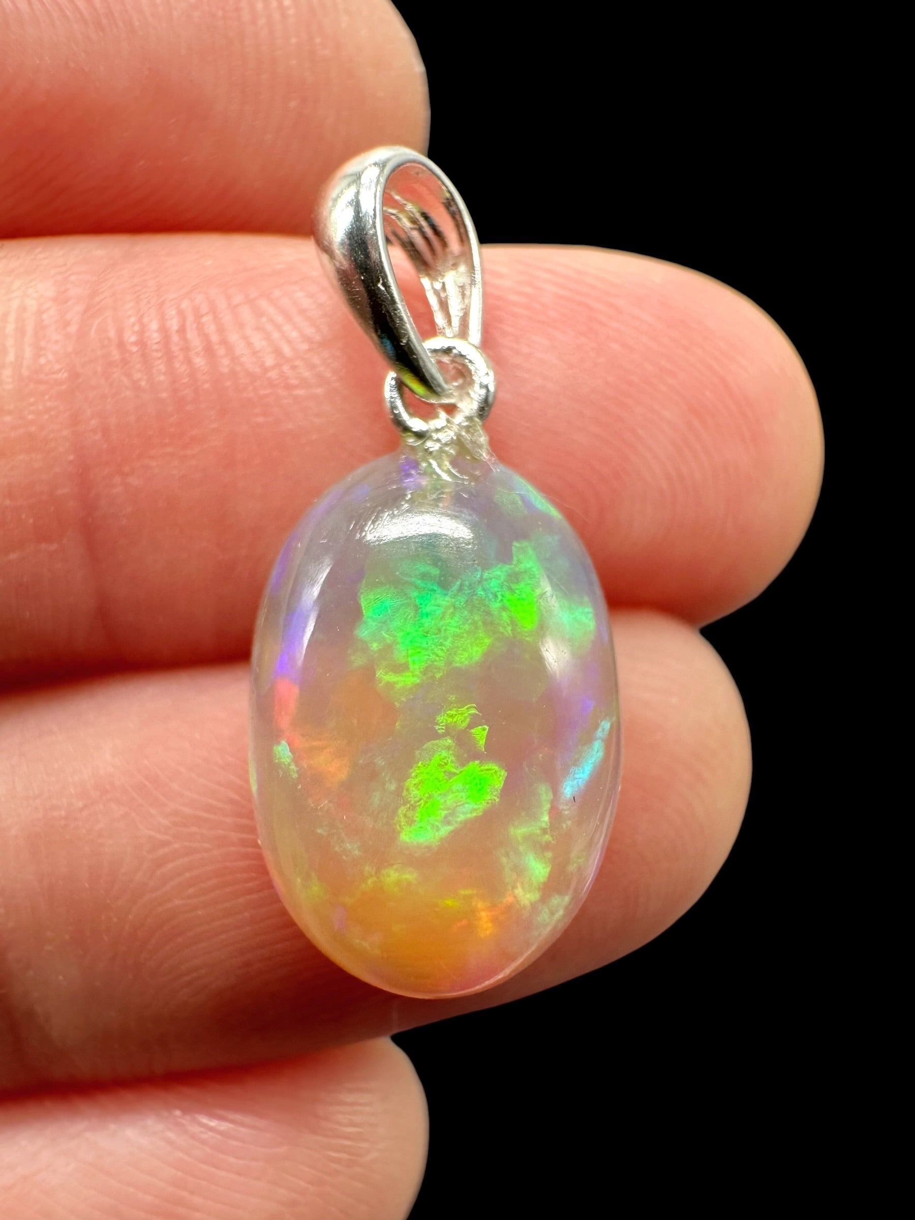 Silver faceted precious opal pendant