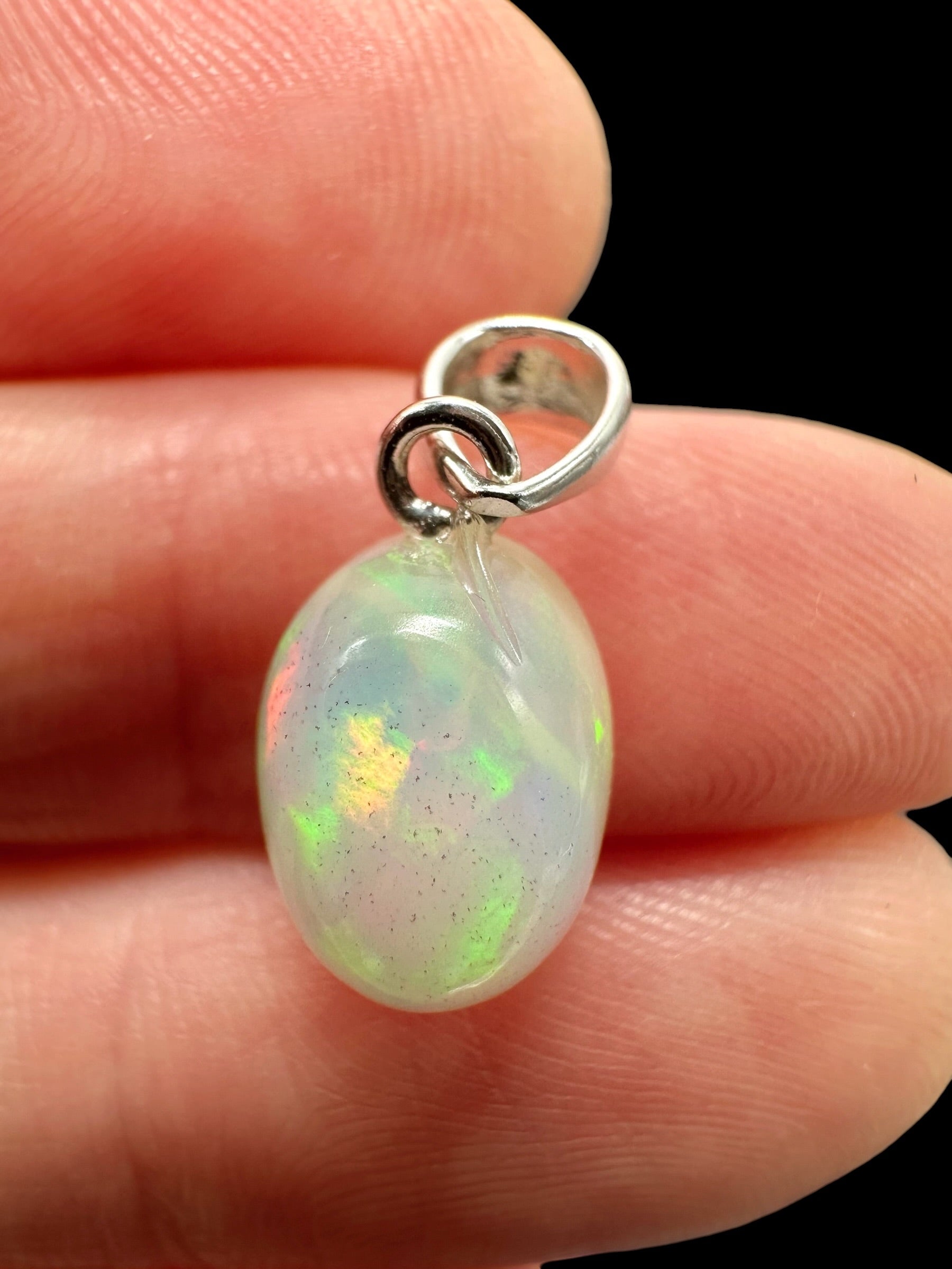 Silver faceted precious opal pendant