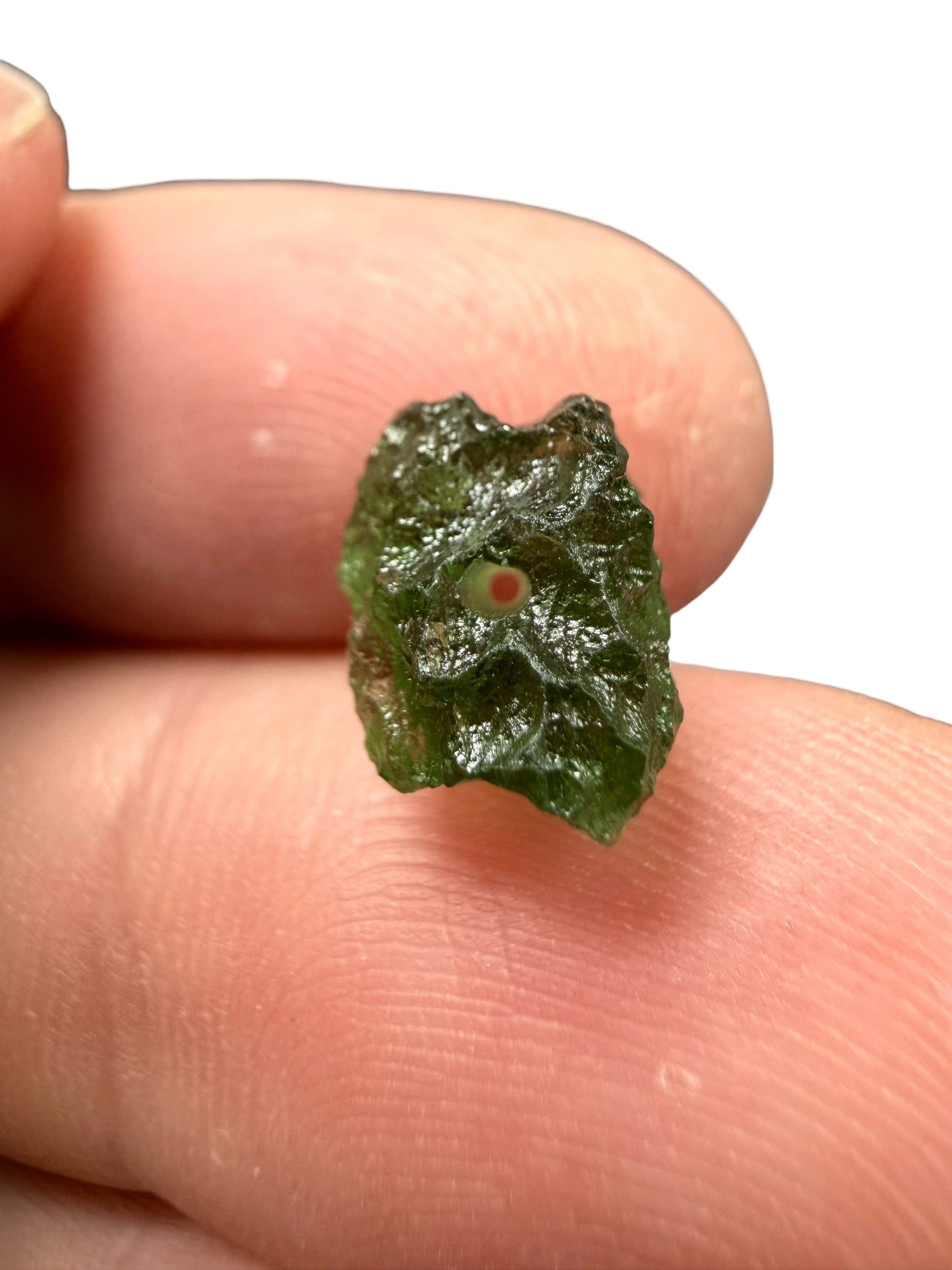 A bead made of raw moldavite 0,62g