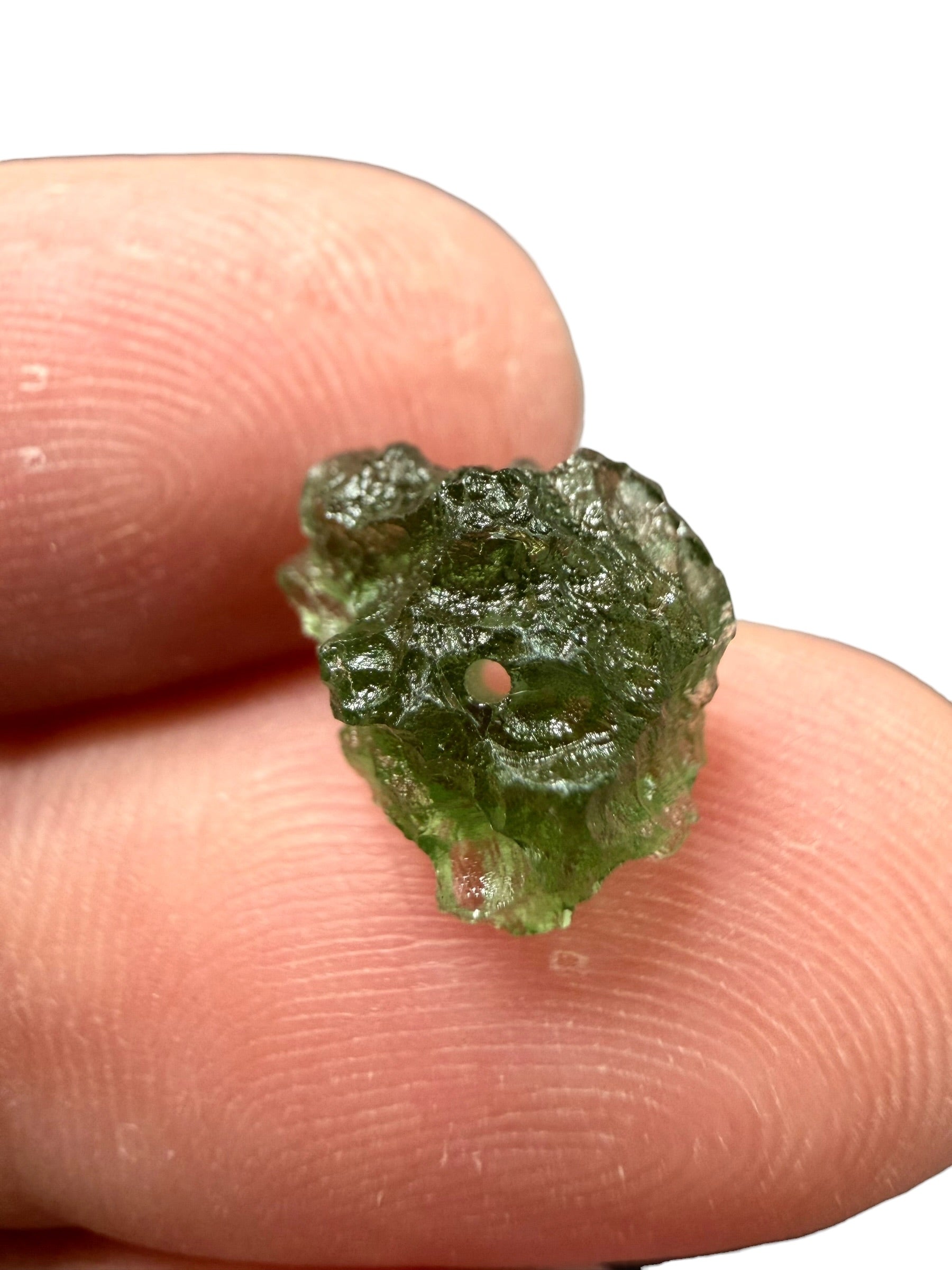 A bead made of raw moldavite 0,78g