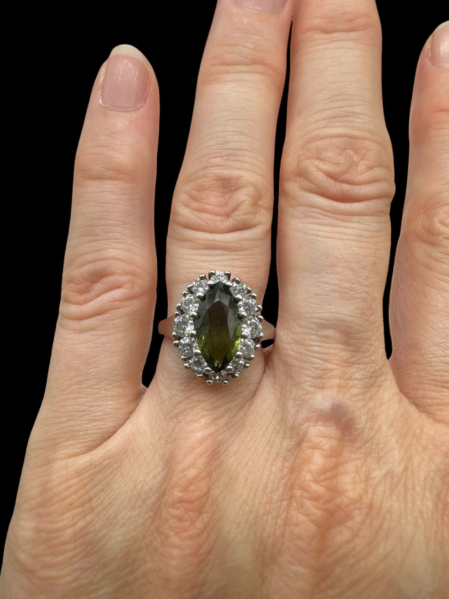 Silver ring with faceted moldavites and zircons size 51