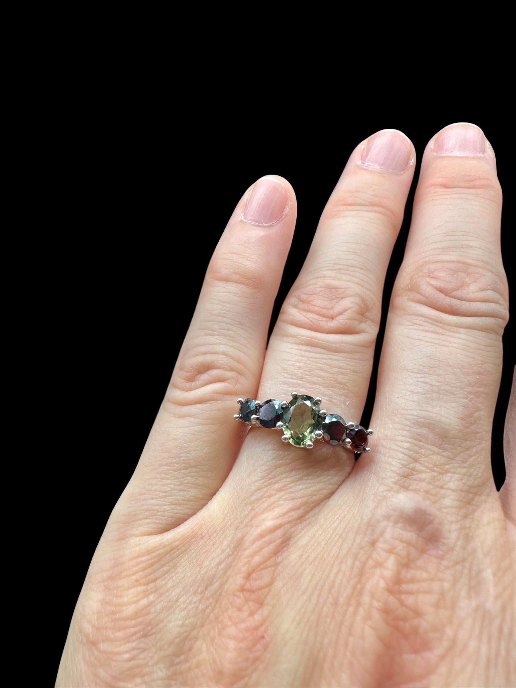 Silver ring with faceted moldavites and garnets size 59