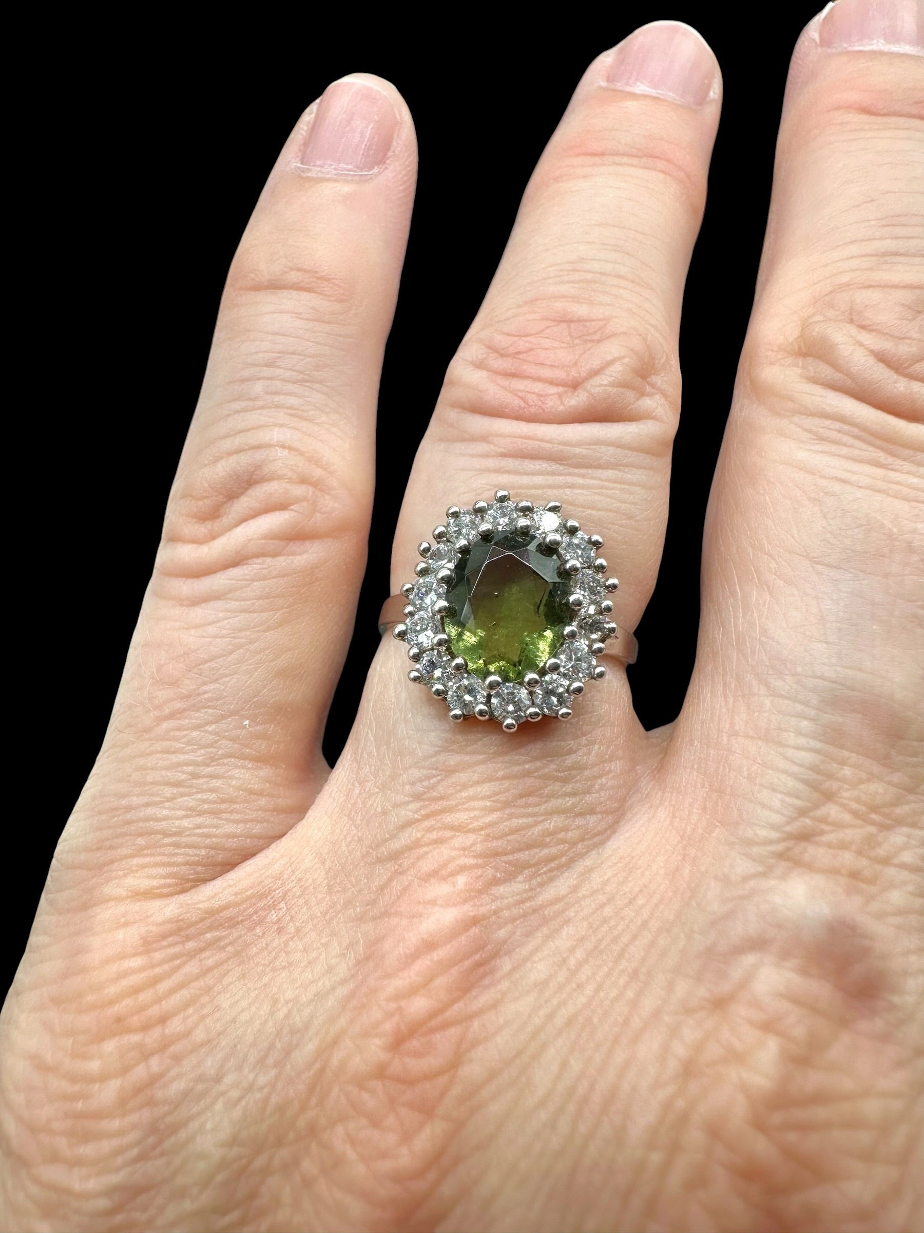 Silver ring with faceted moldavites and zircons size 50