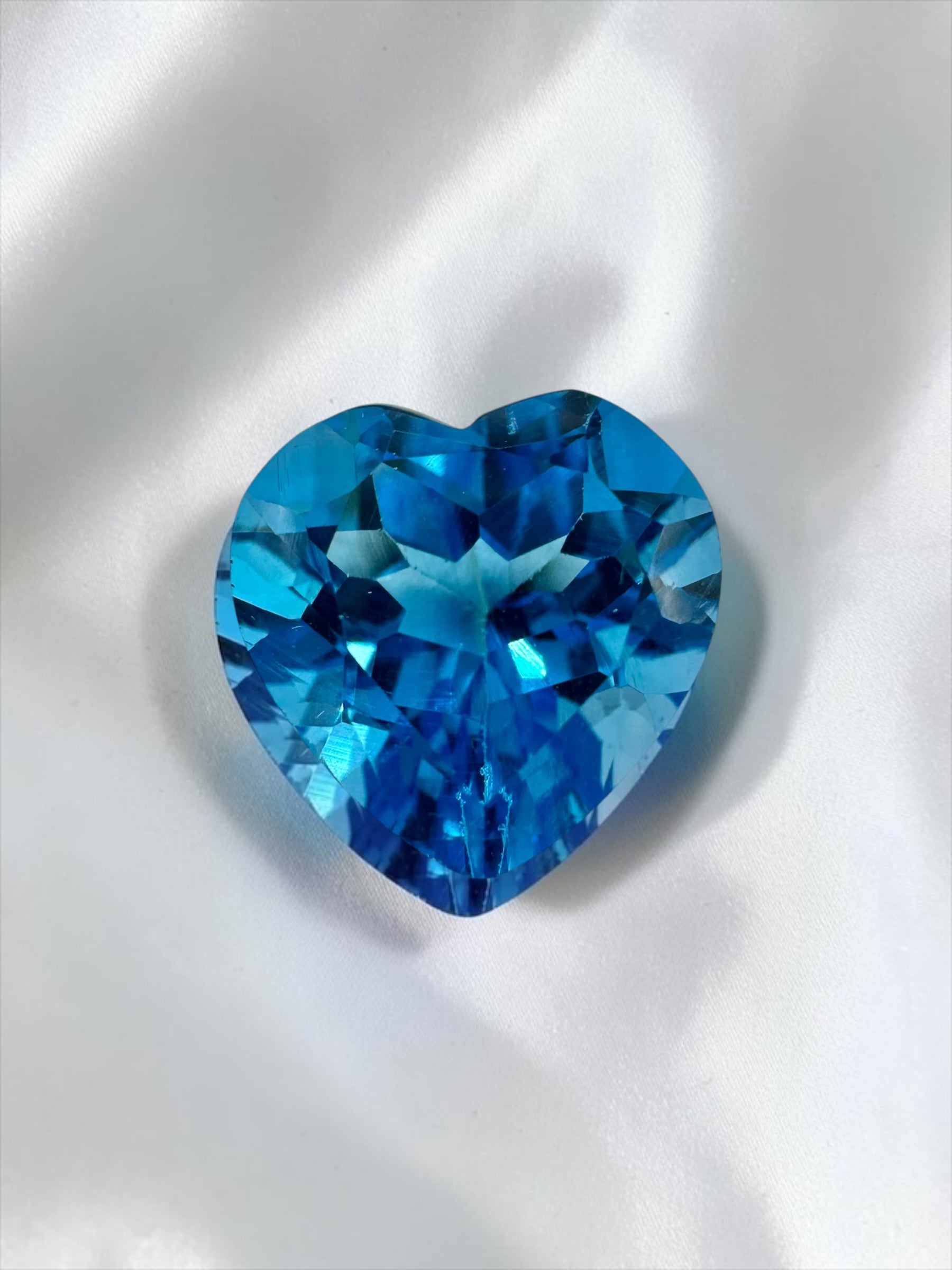 Faceted Heart-Shaped Swiss Blue Topaz from Sri Lanka → random choice