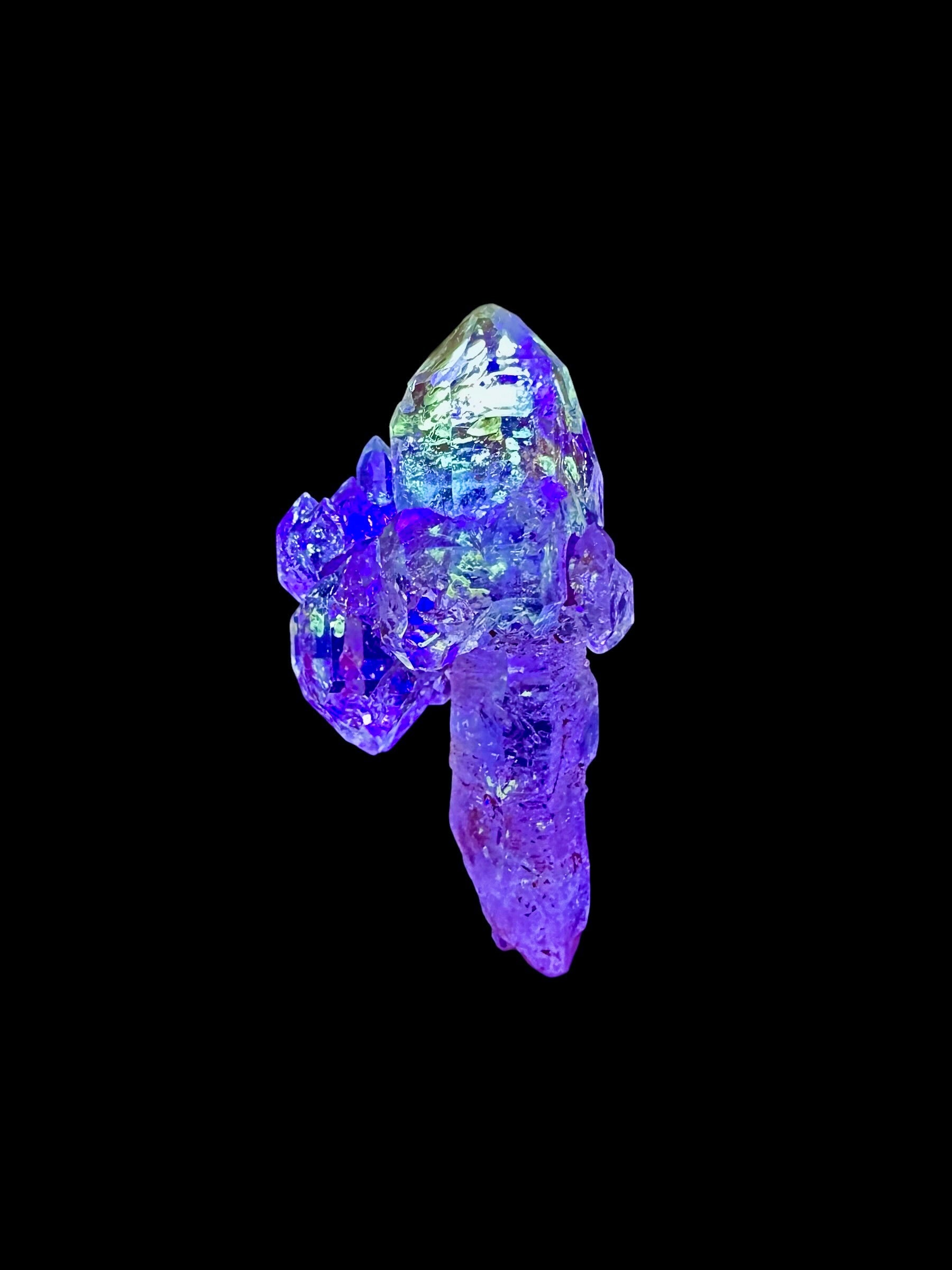 Crystal with petroleum inclusions – Madagascar