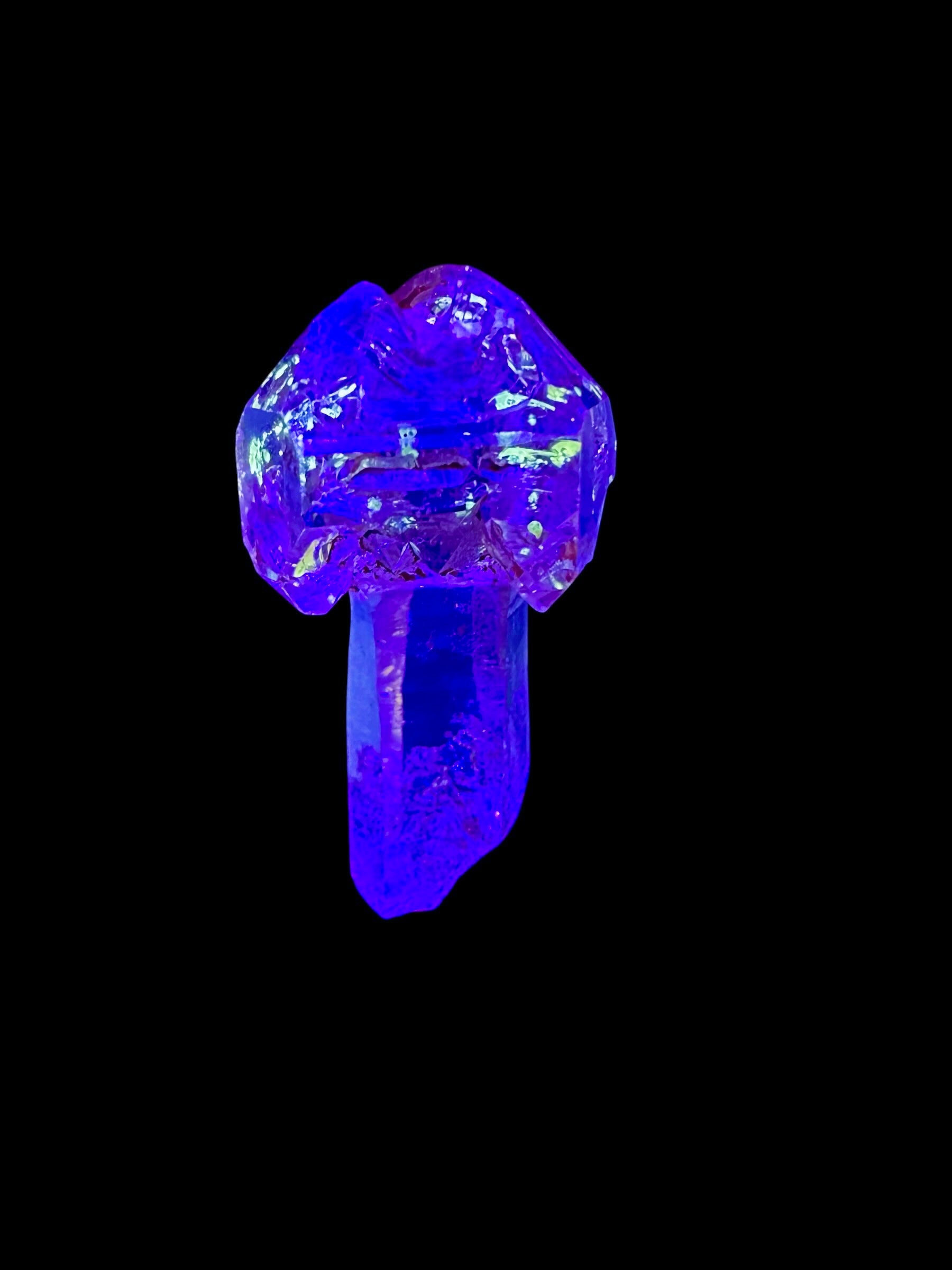 Crystal with petroleum inclusions – Madagascar