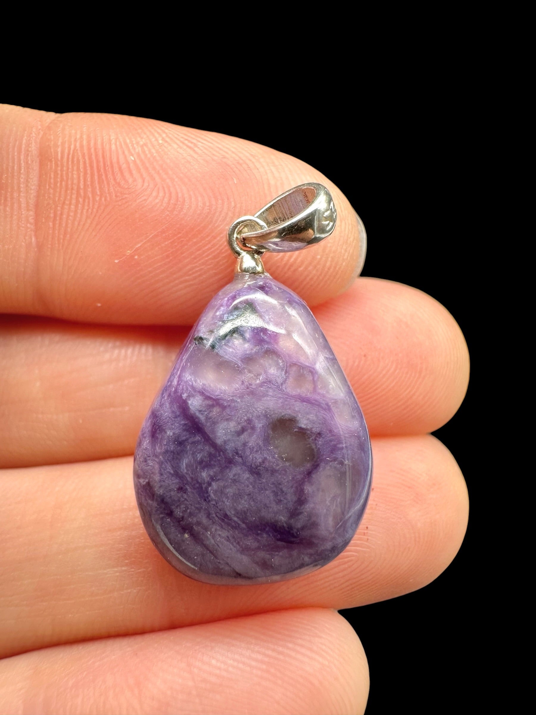 Silver pendant made of charoite