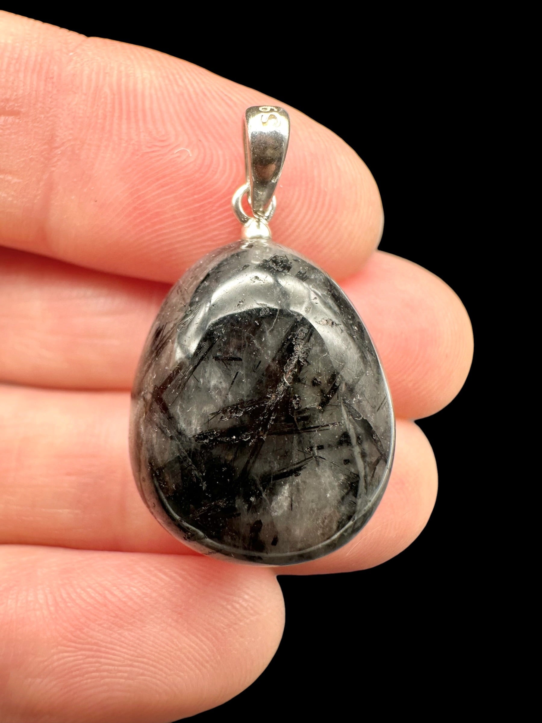 Silver pendant made of crystal with tourmaline
