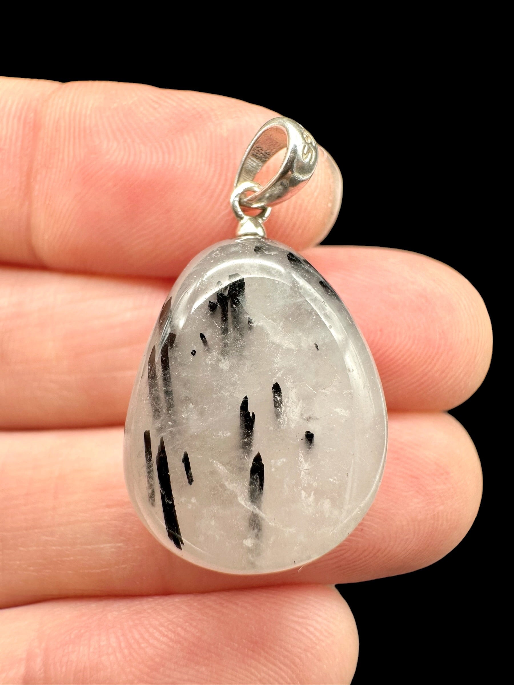Silver pendant made of crystal with tourmaline