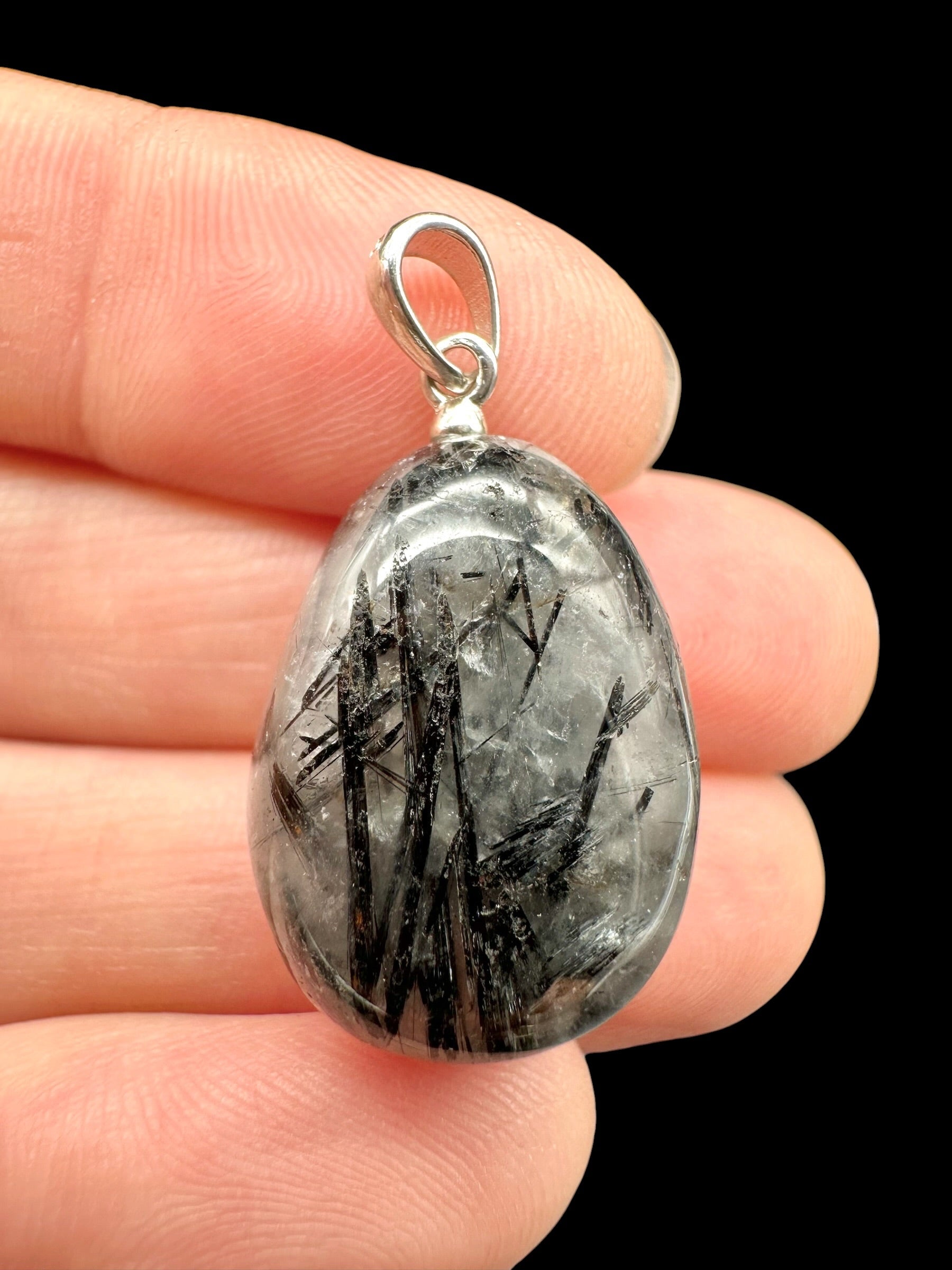 Silver pendant made of crystal with tourmaline