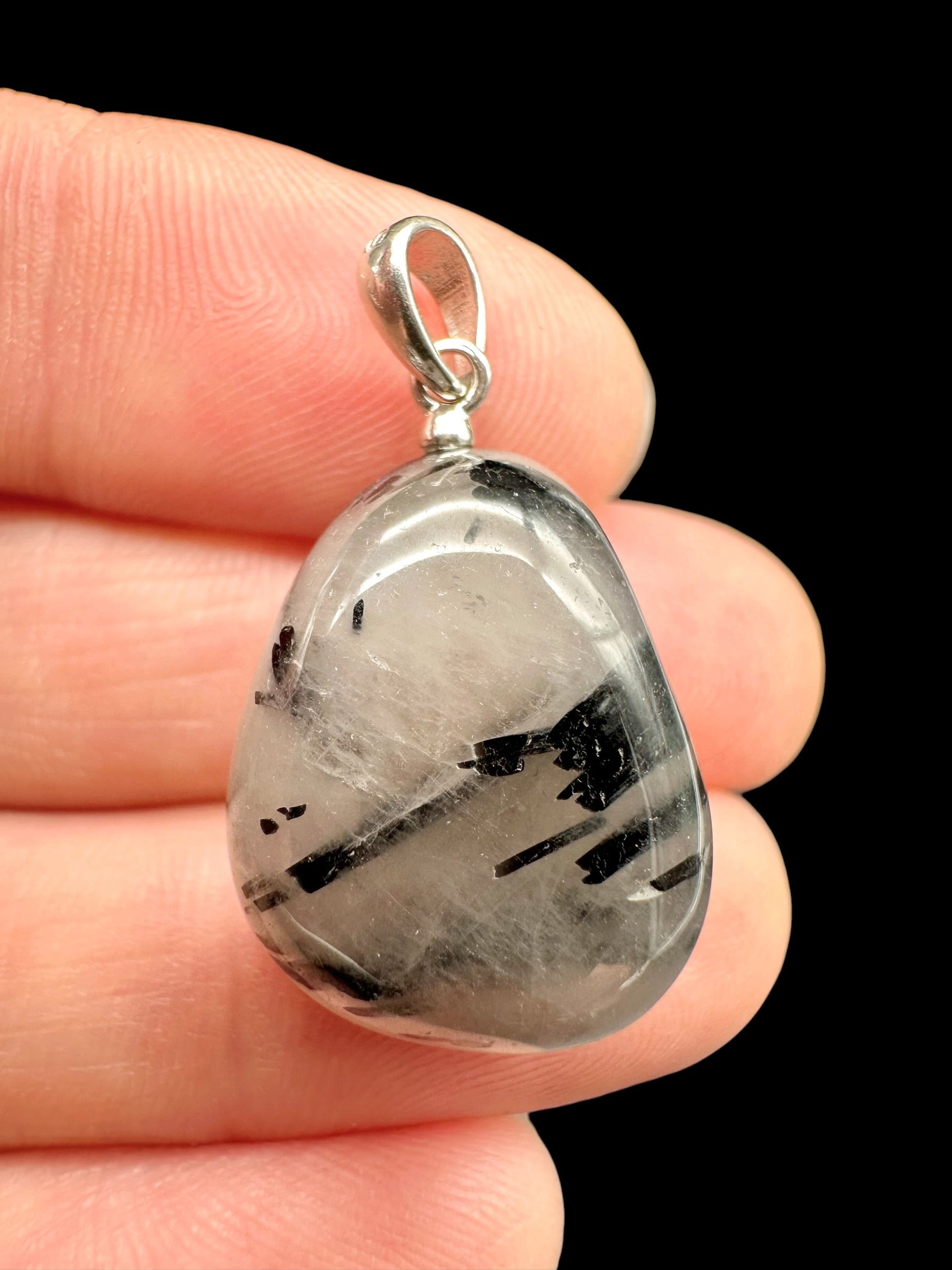 Silver pendant made of crystal with tourmaline