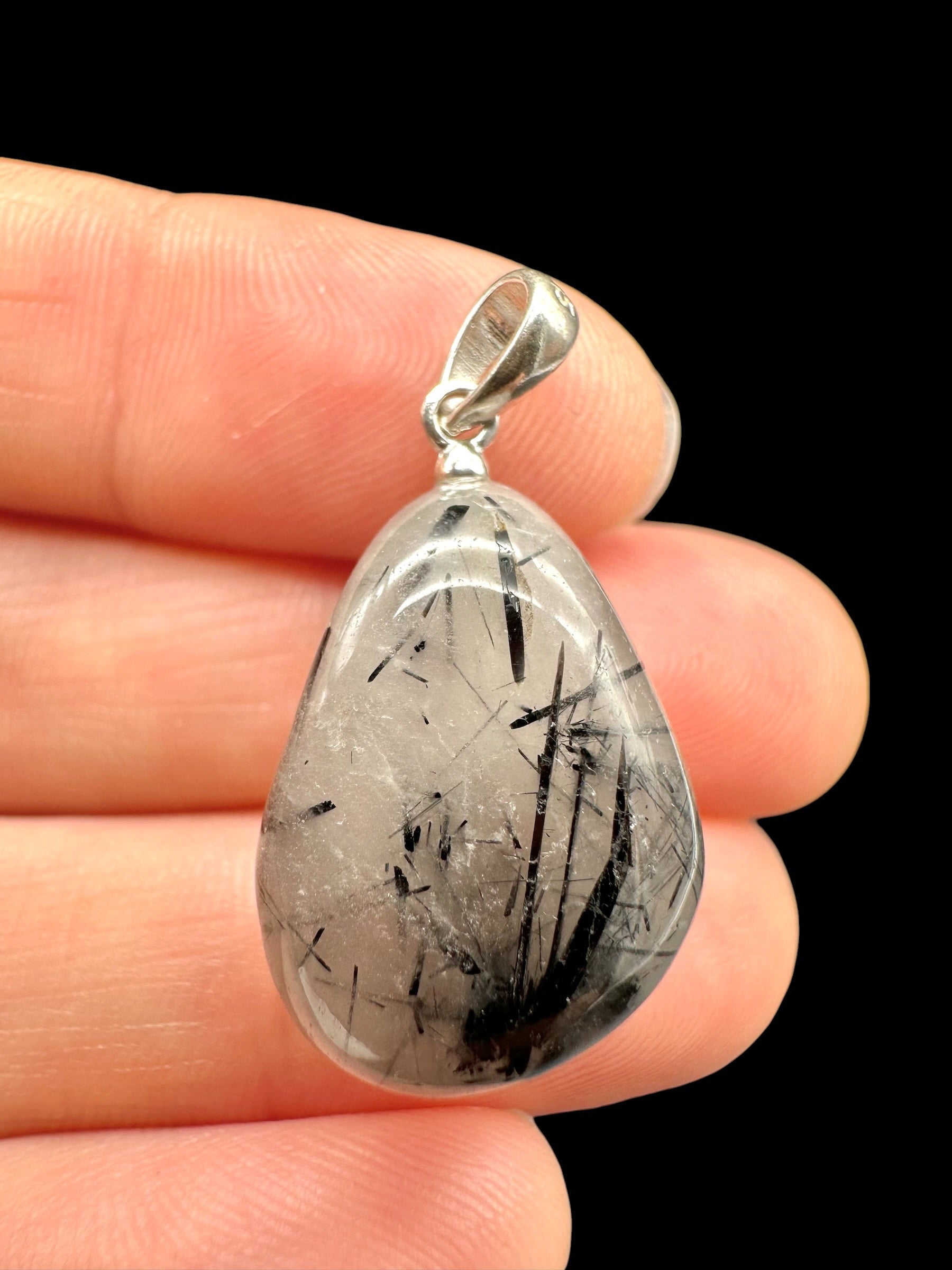 Silver pendant made of crystal with tourmaline