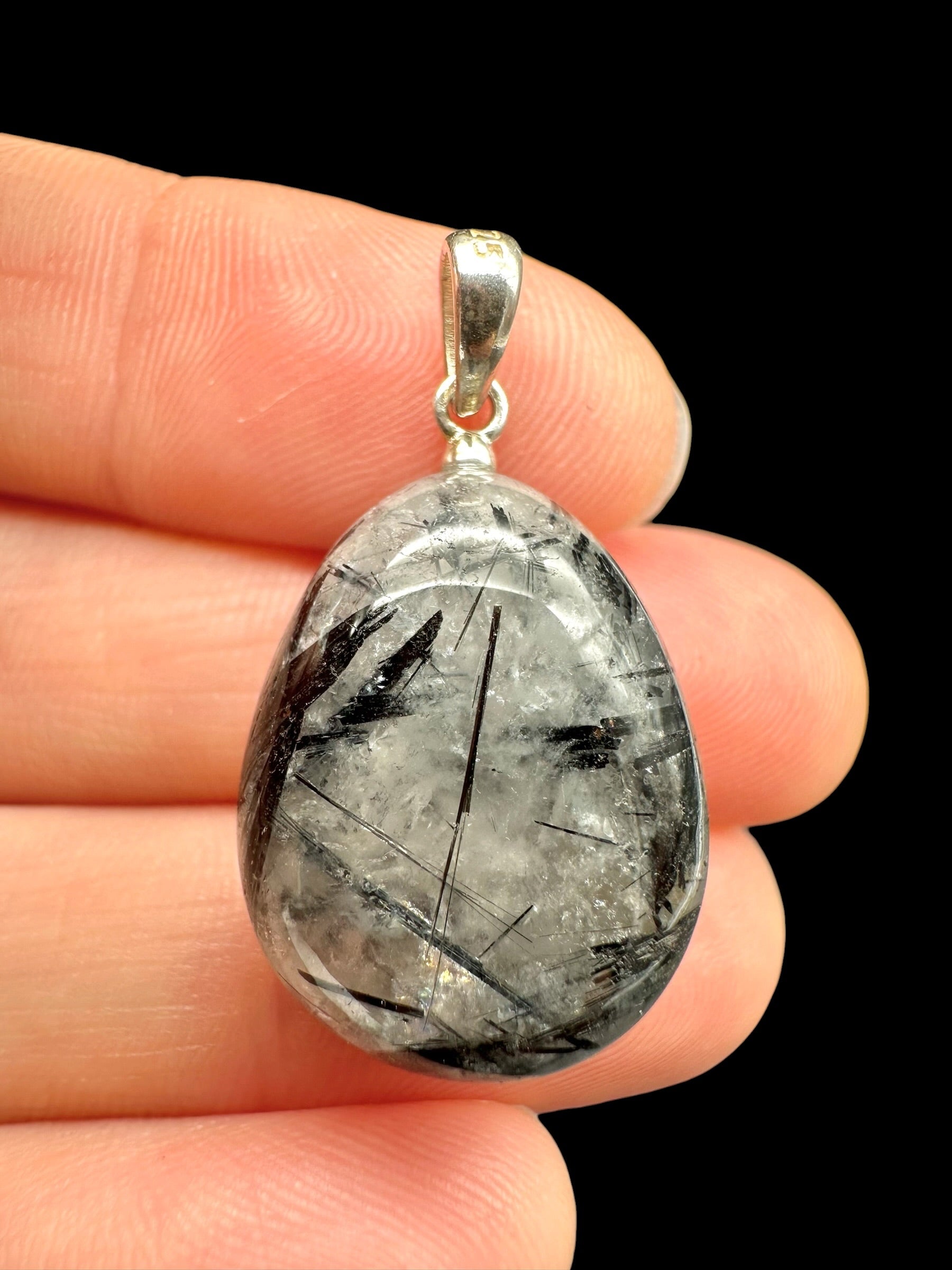 Silver pendant made of crystal with tourmaline