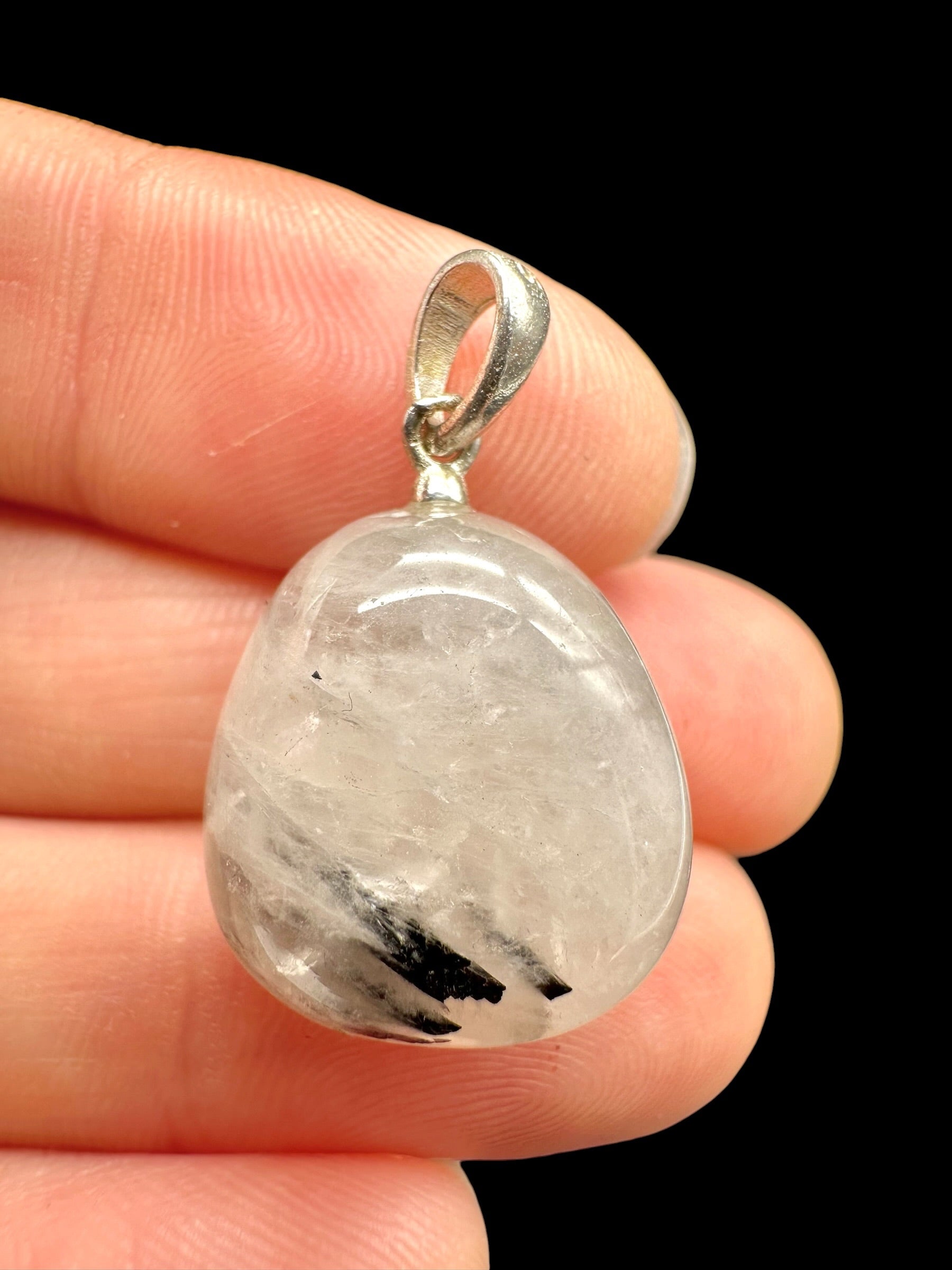 Silver pendant made of crystal with tourmaline