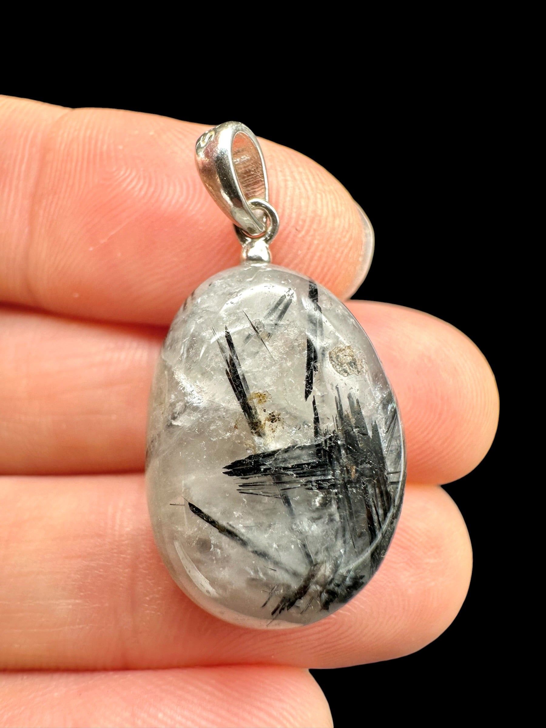 Silver pendant made of crystal with tourmaline