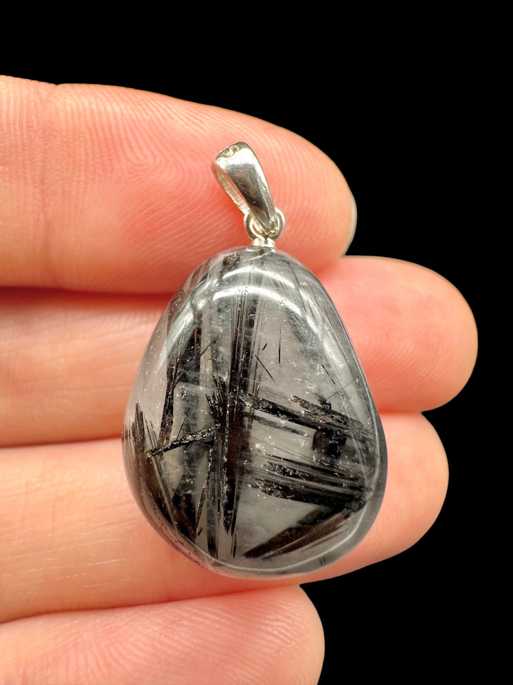 Silver pendant made of crystal with tourmaline