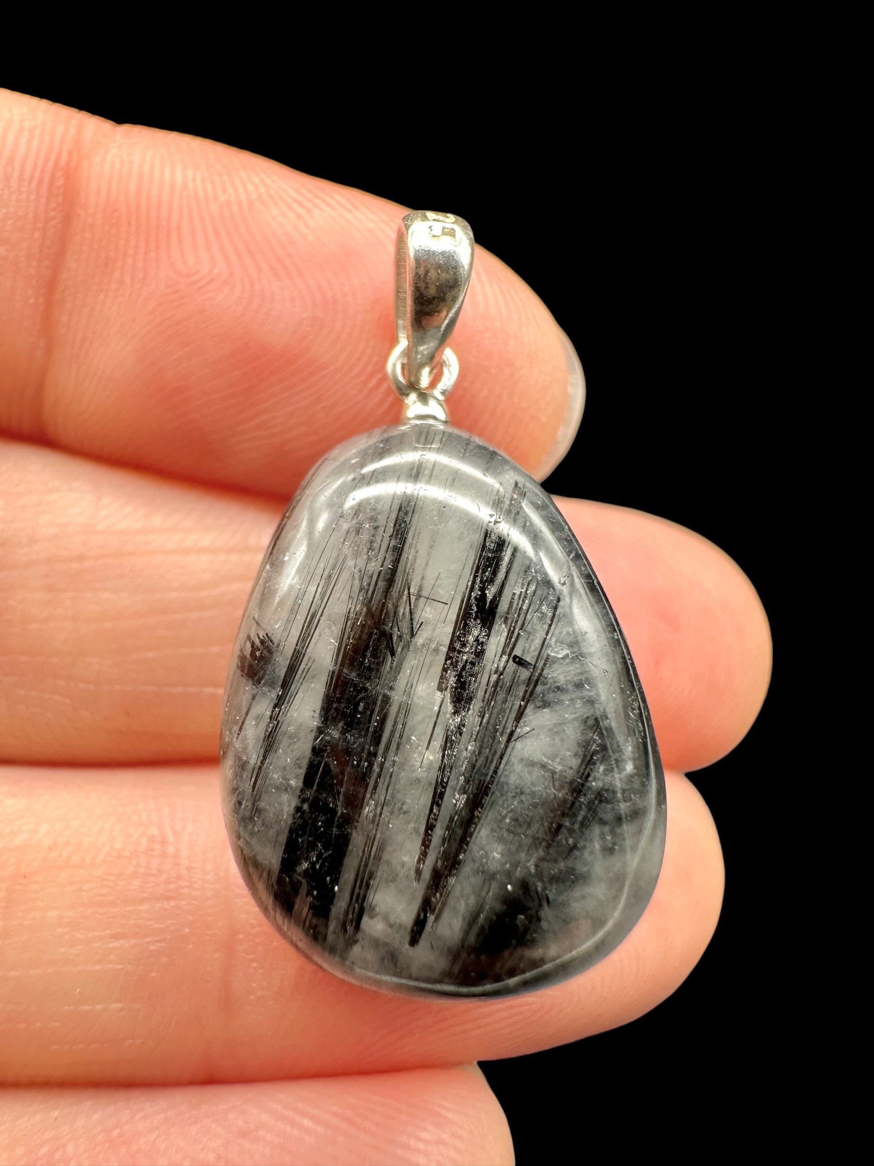 Silver pendant made of crystal with tourmaline
