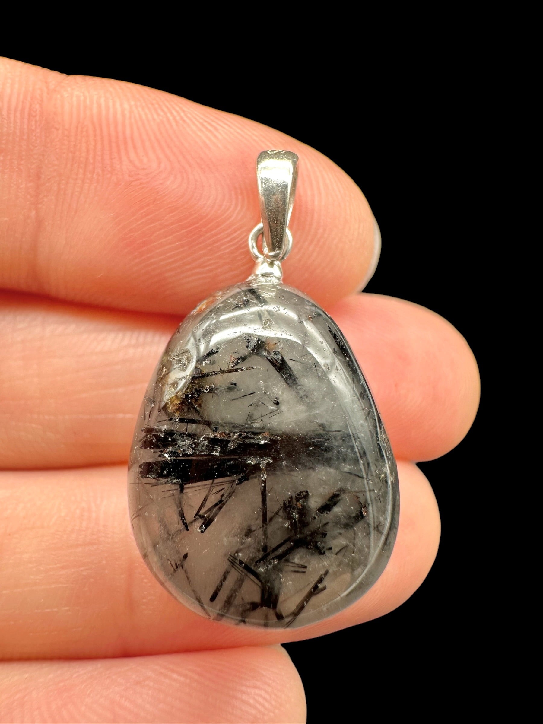 Silver pendant made of crystal with tourmaline