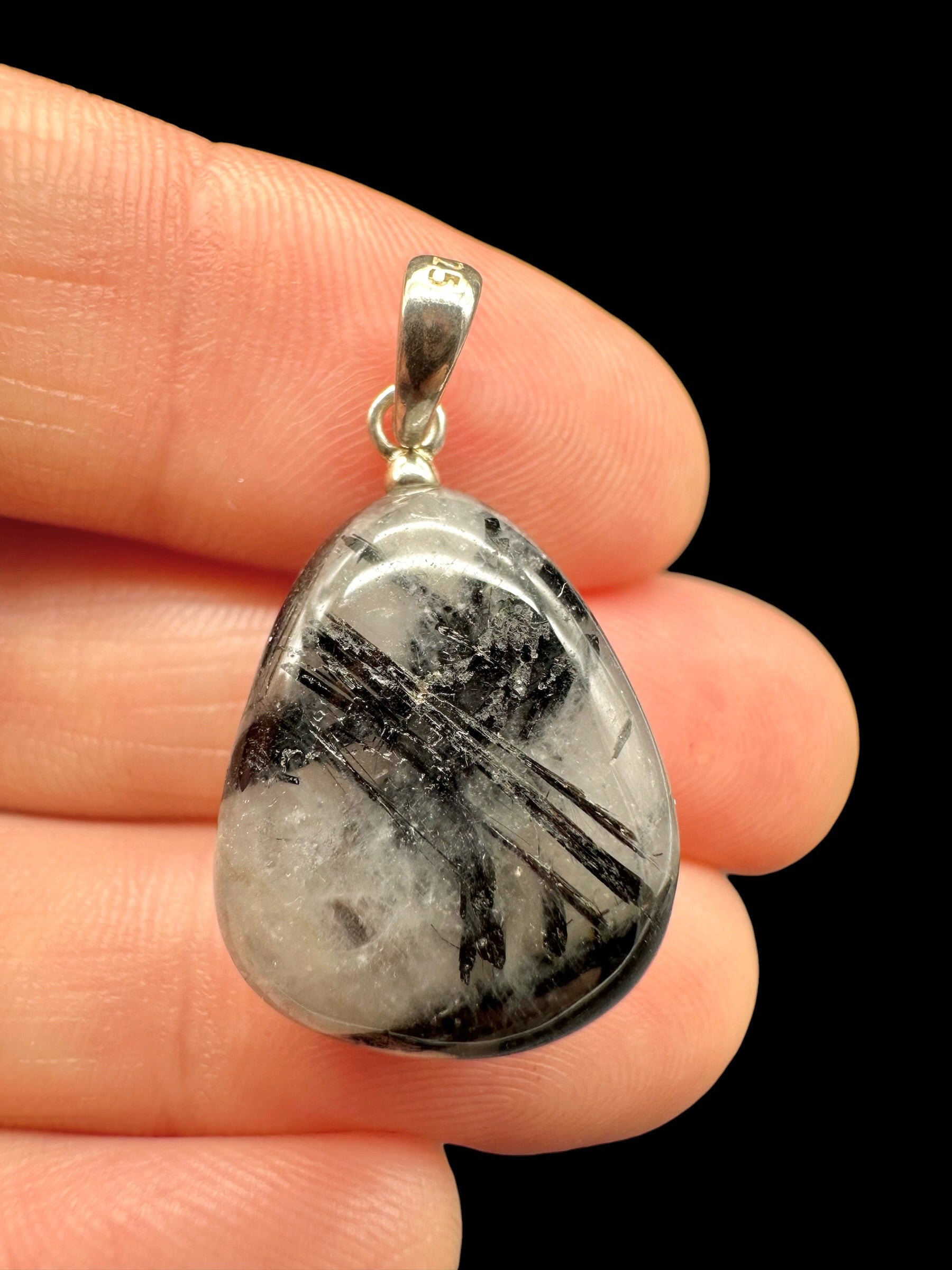 Silver pendant made of crystal with tourmaline