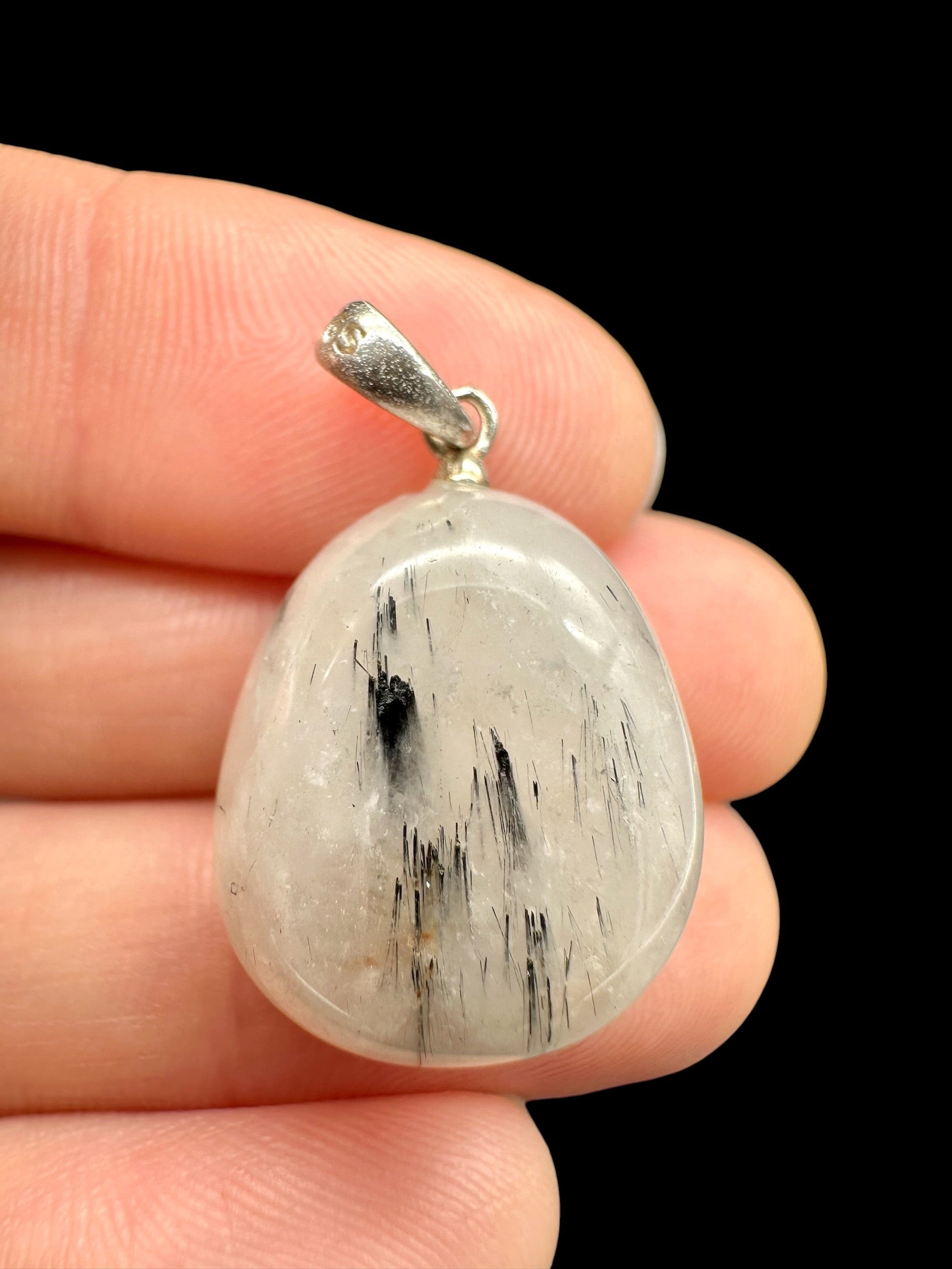 Silver pendant made of crystal with tourmaline