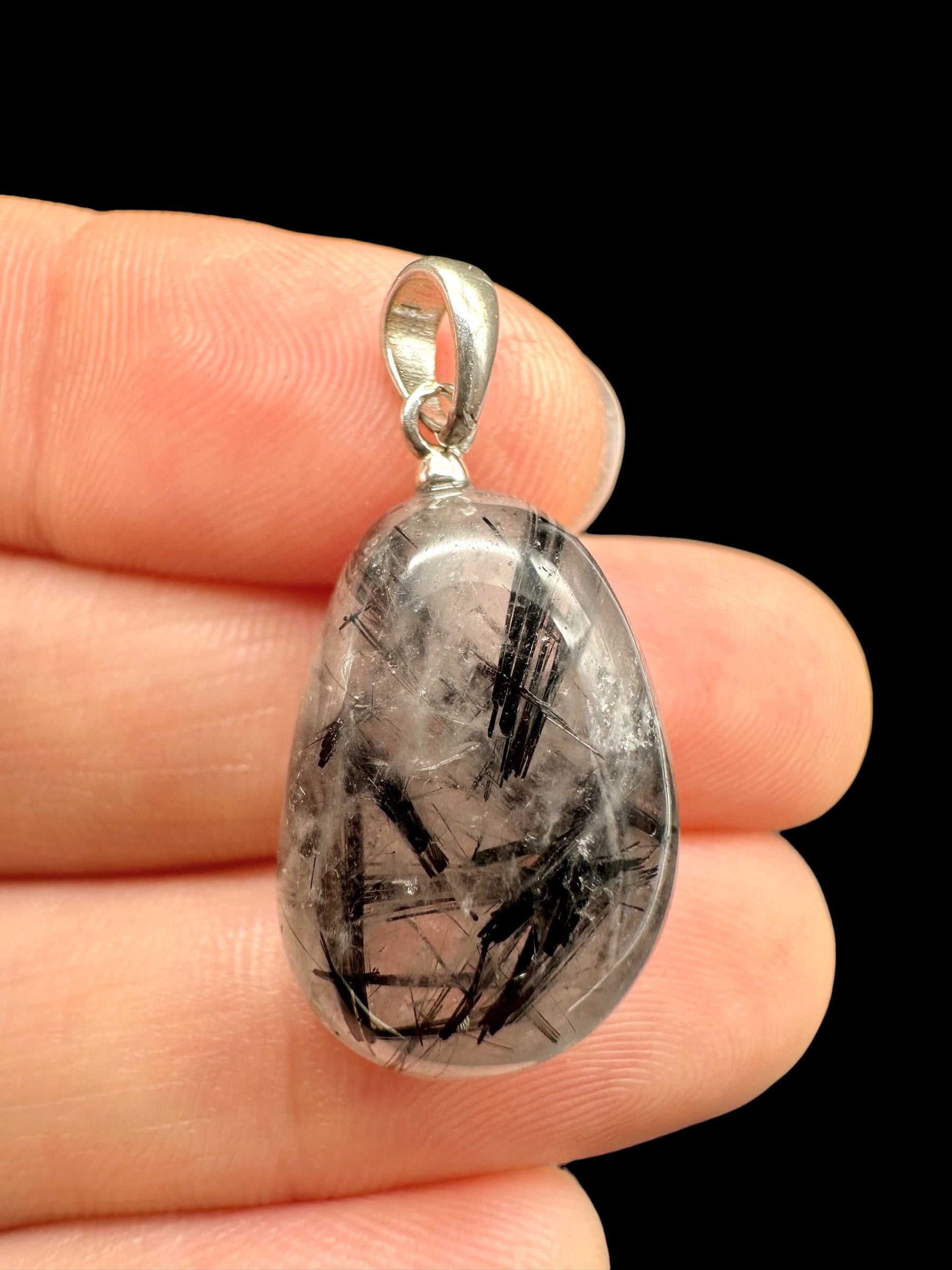 Silver pendant made of crystal with tourmaline