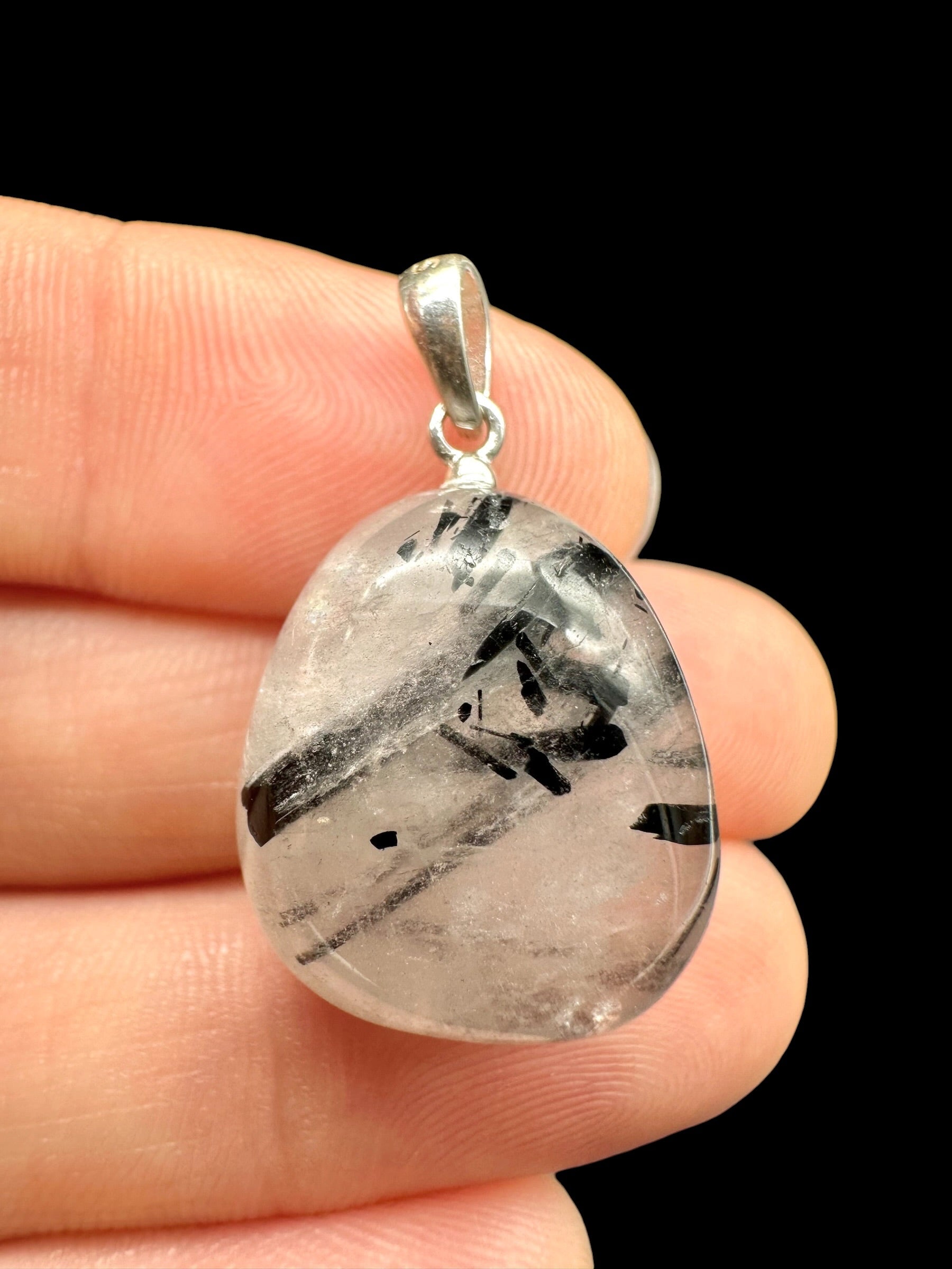 Silver pendant made of crystal with tourmaline