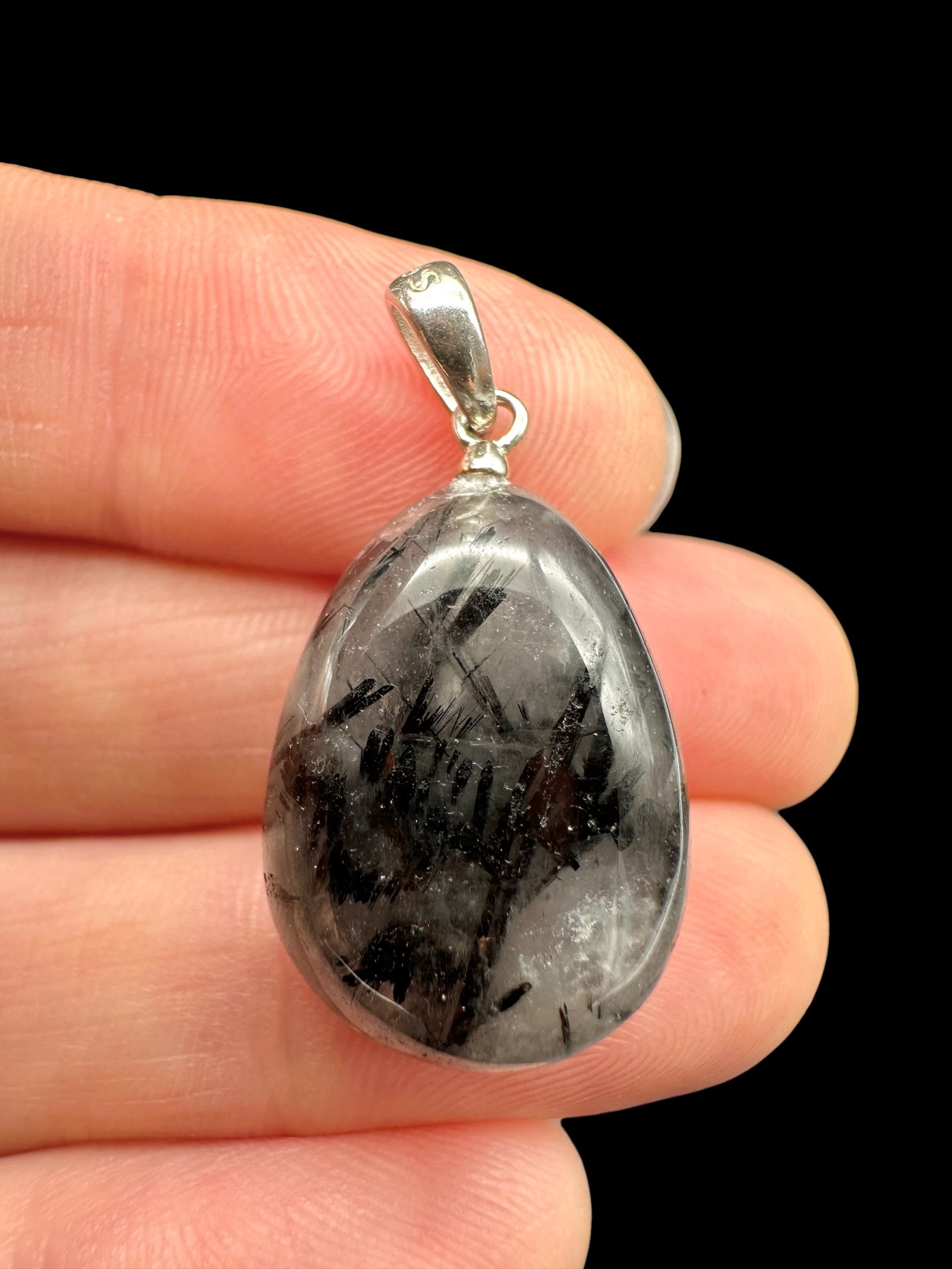 Silver pendant made of crystal with tourmaline