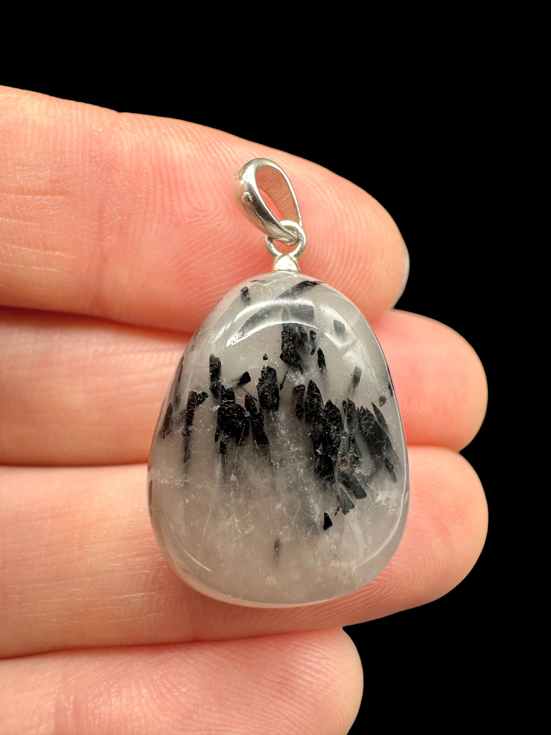 Silver pendant made of crystal with tourmaline