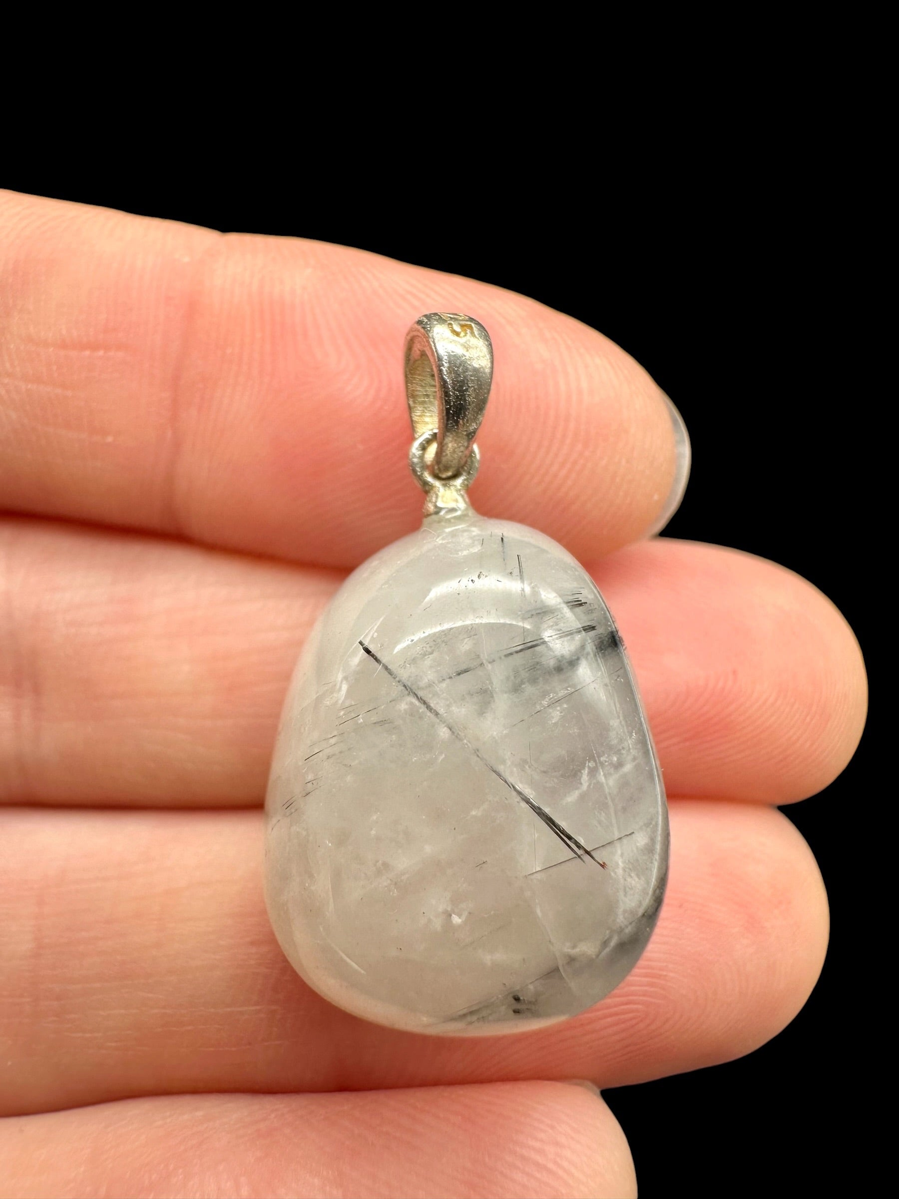 Silver pendant made of crystal with tourmaline