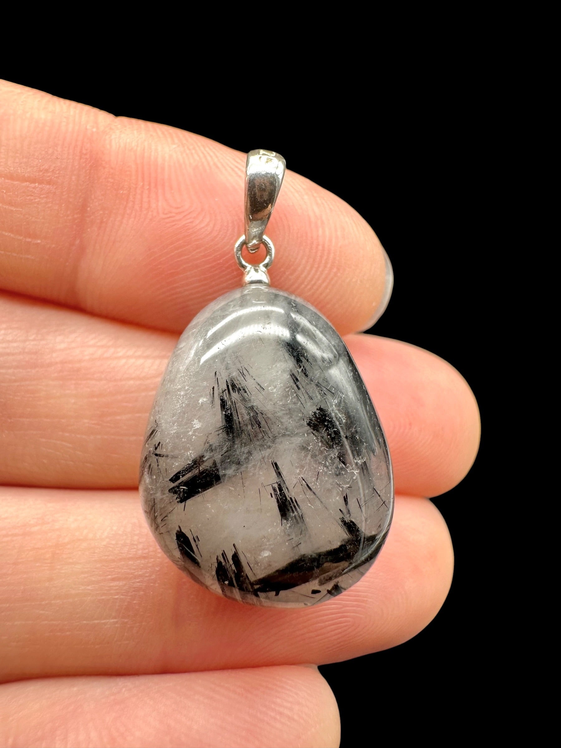 Silver pendant made of crystal with tourmaline