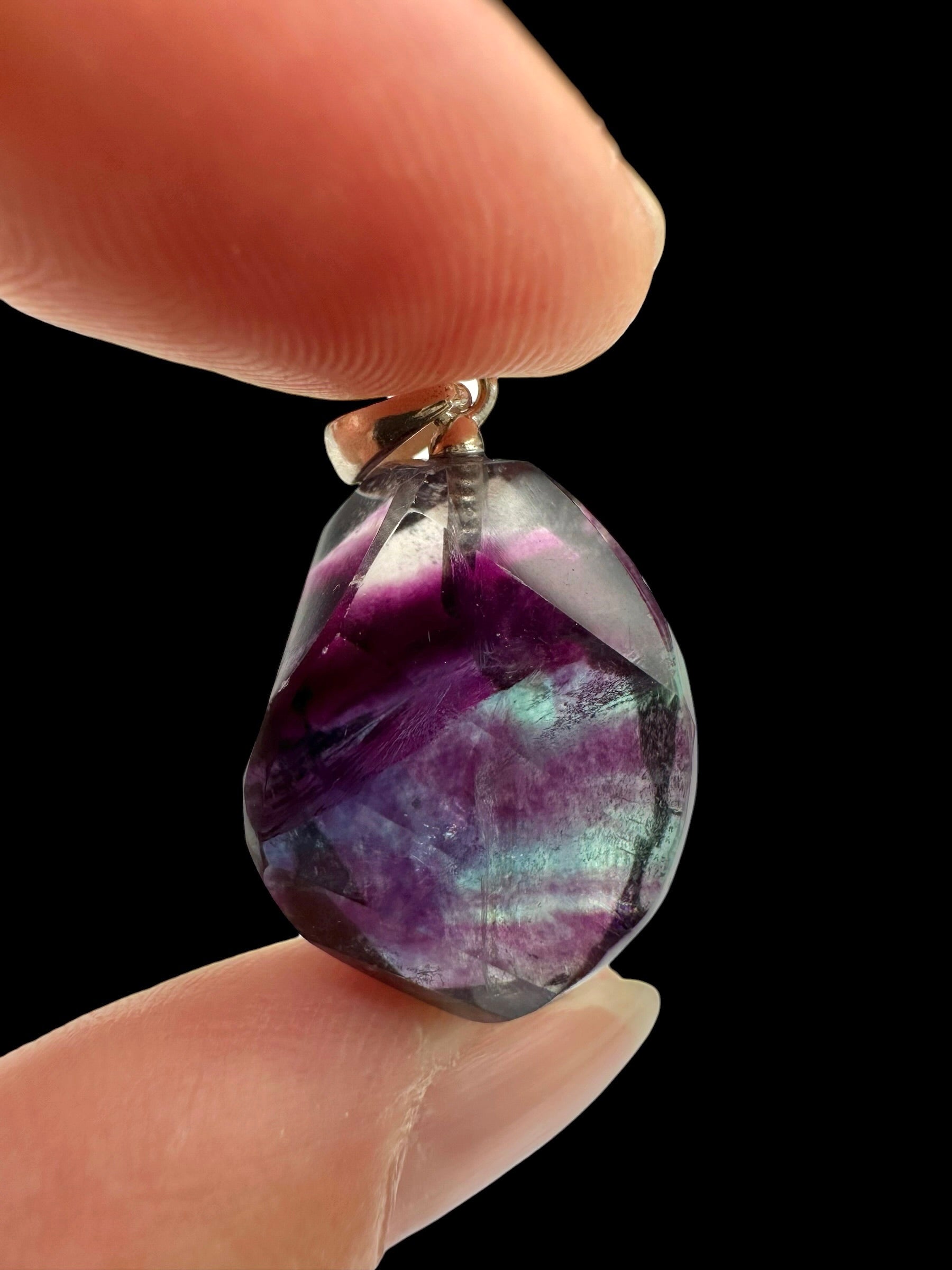 Silver pendant made of faceted fluorite