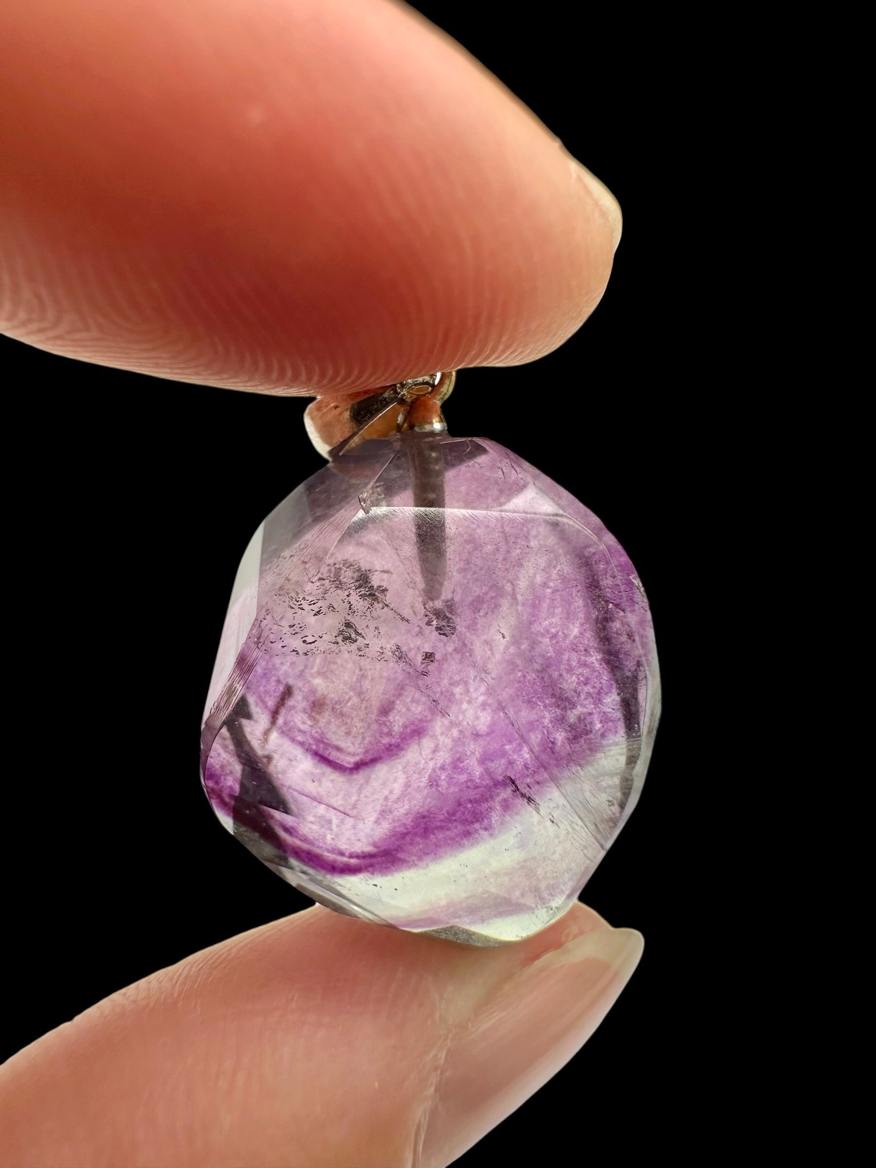 Silver pendant made of faceted fluorite