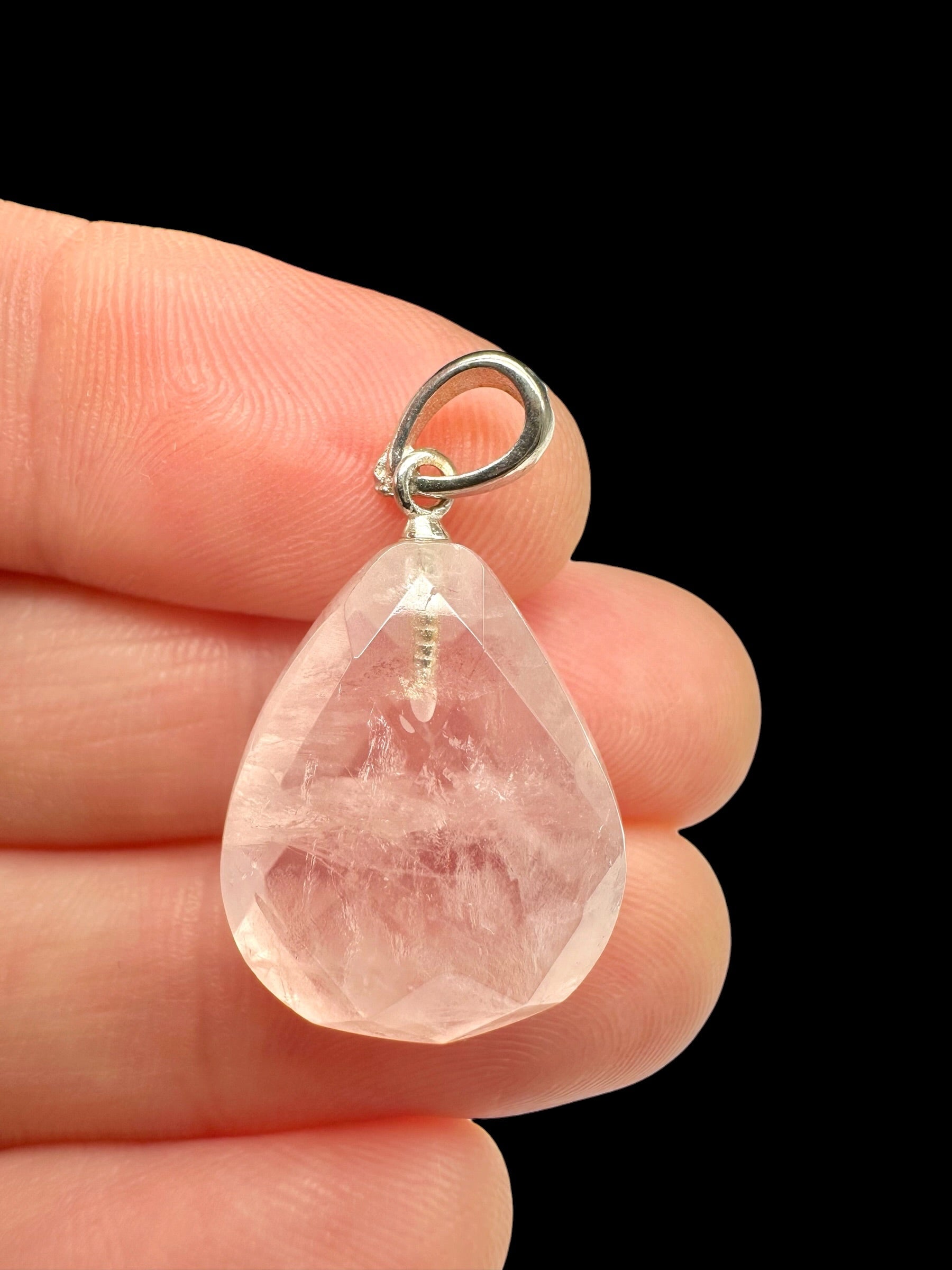 Silver pendant made of faceted rose quartz