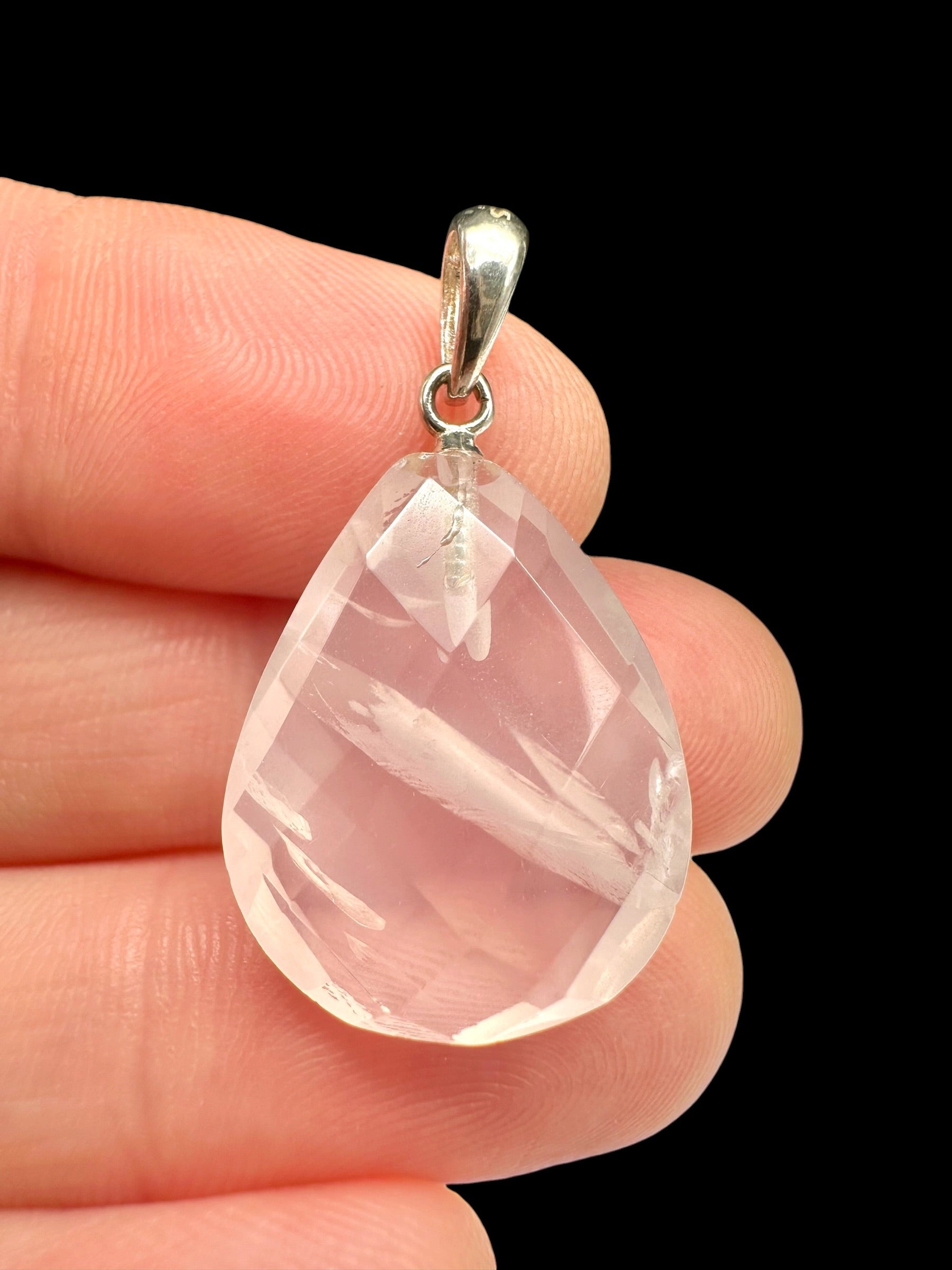 Silver pendant made of faceted rose quartz