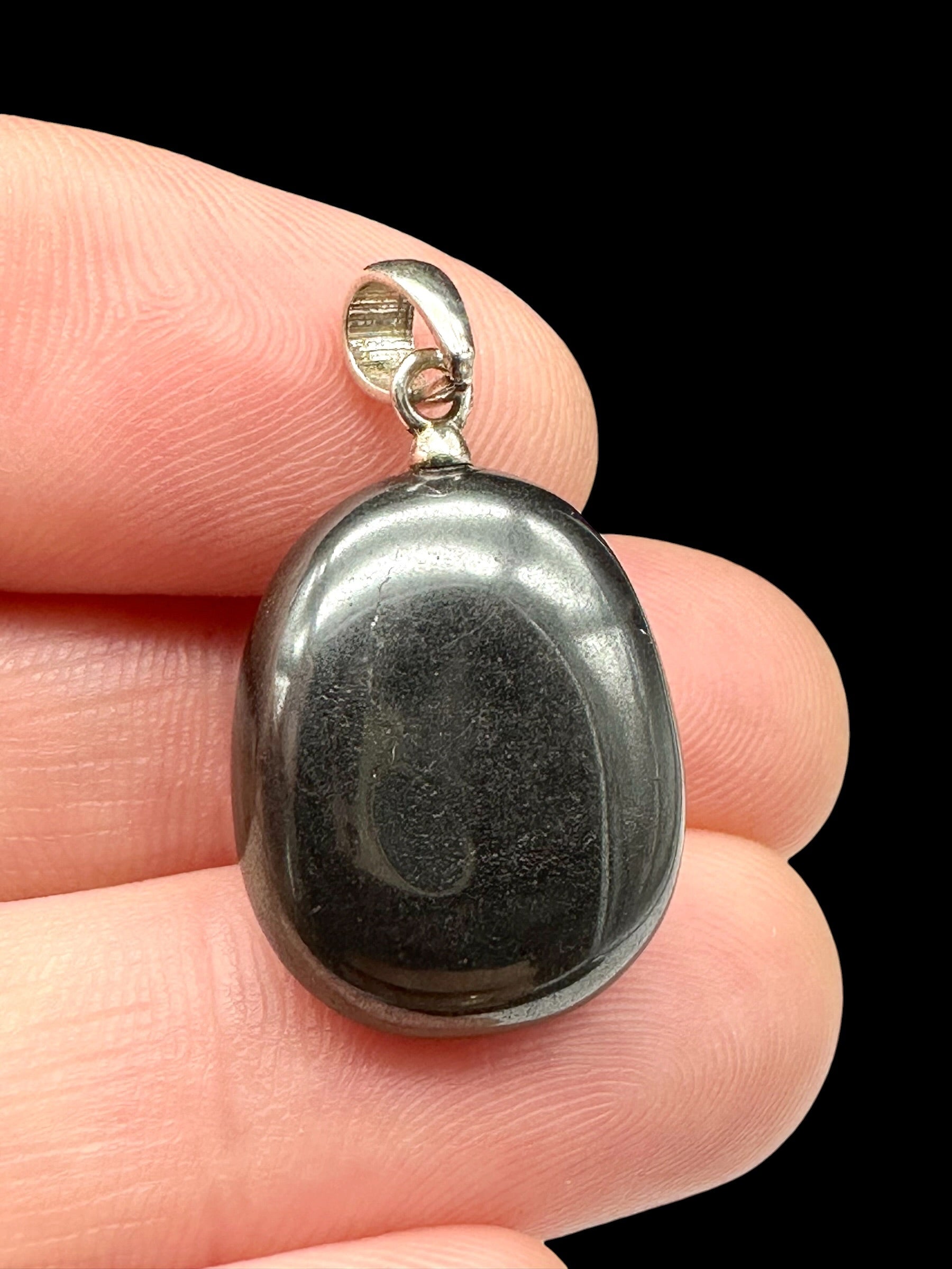 Silver pendant made of hematite