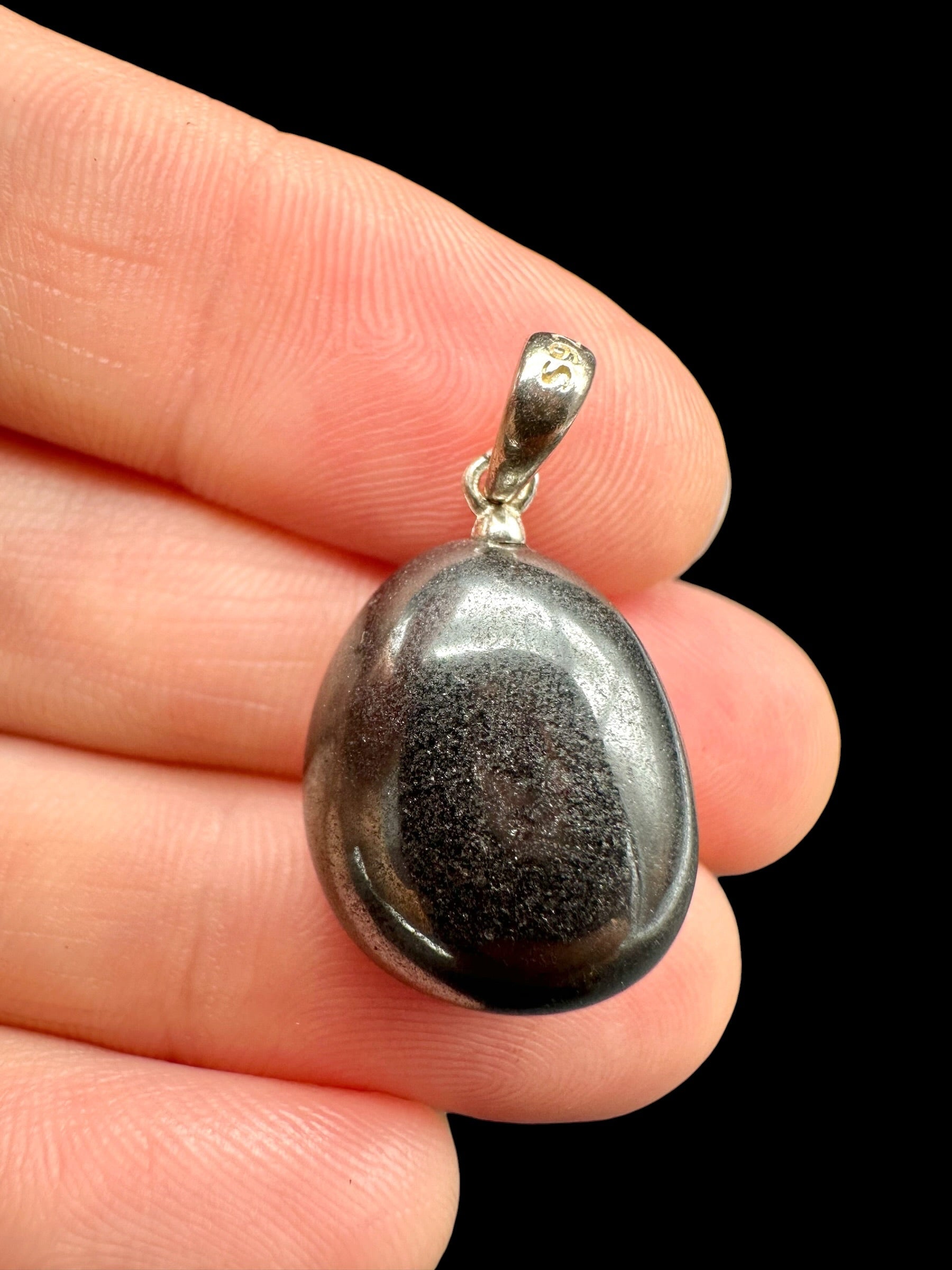 Silver pendant made of hematite