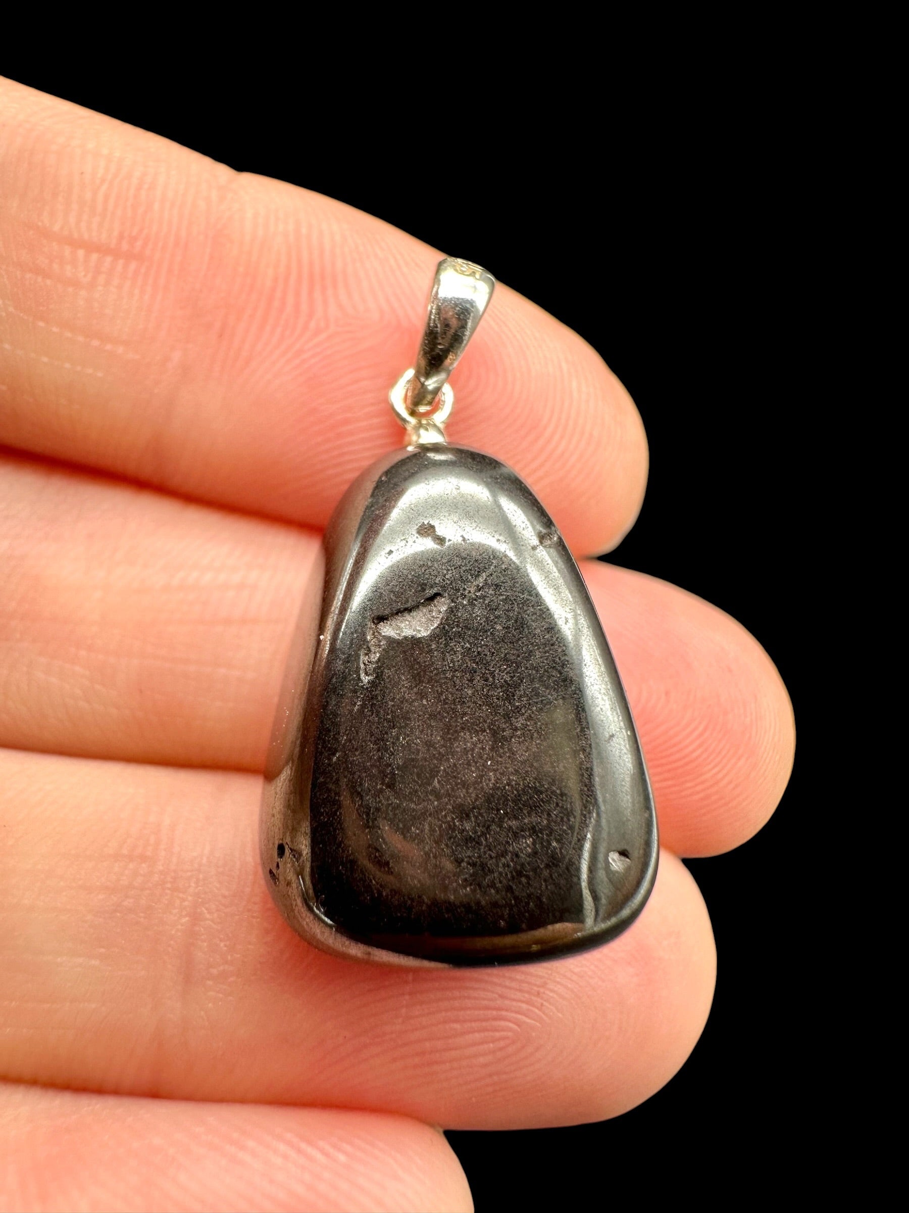 Silver pendant made of hematite