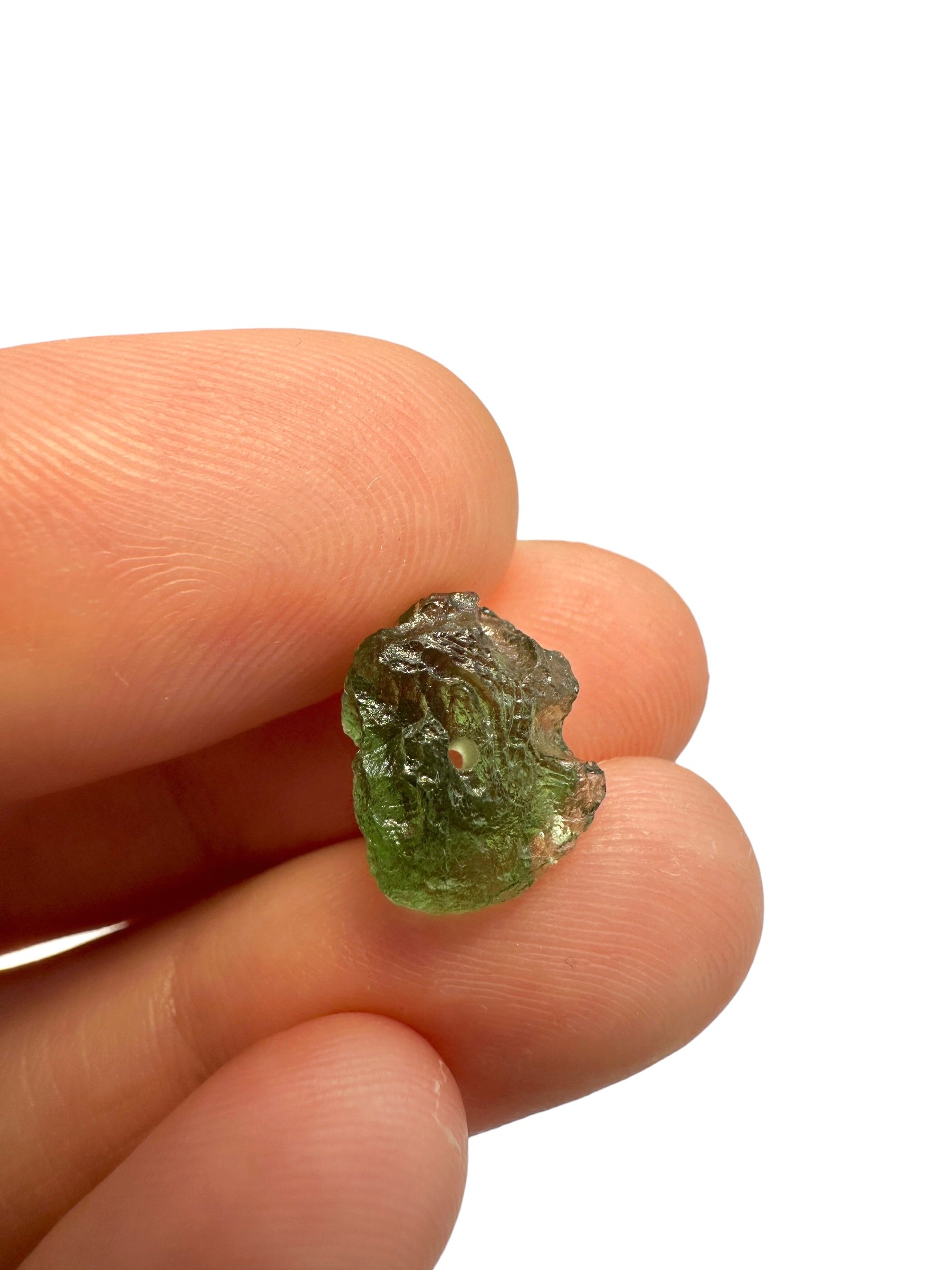 A bead made of raw moldavite 0,8g
