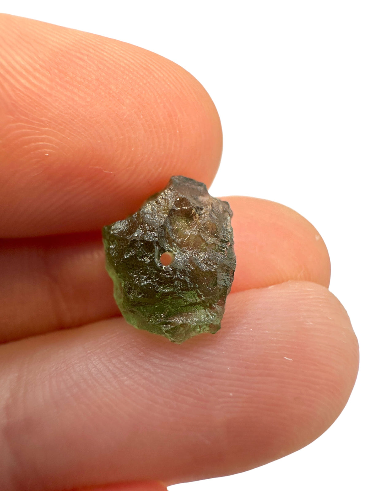 A bead made of raw moldavite 0,67g