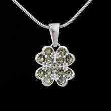 Silver pendant with moldavites